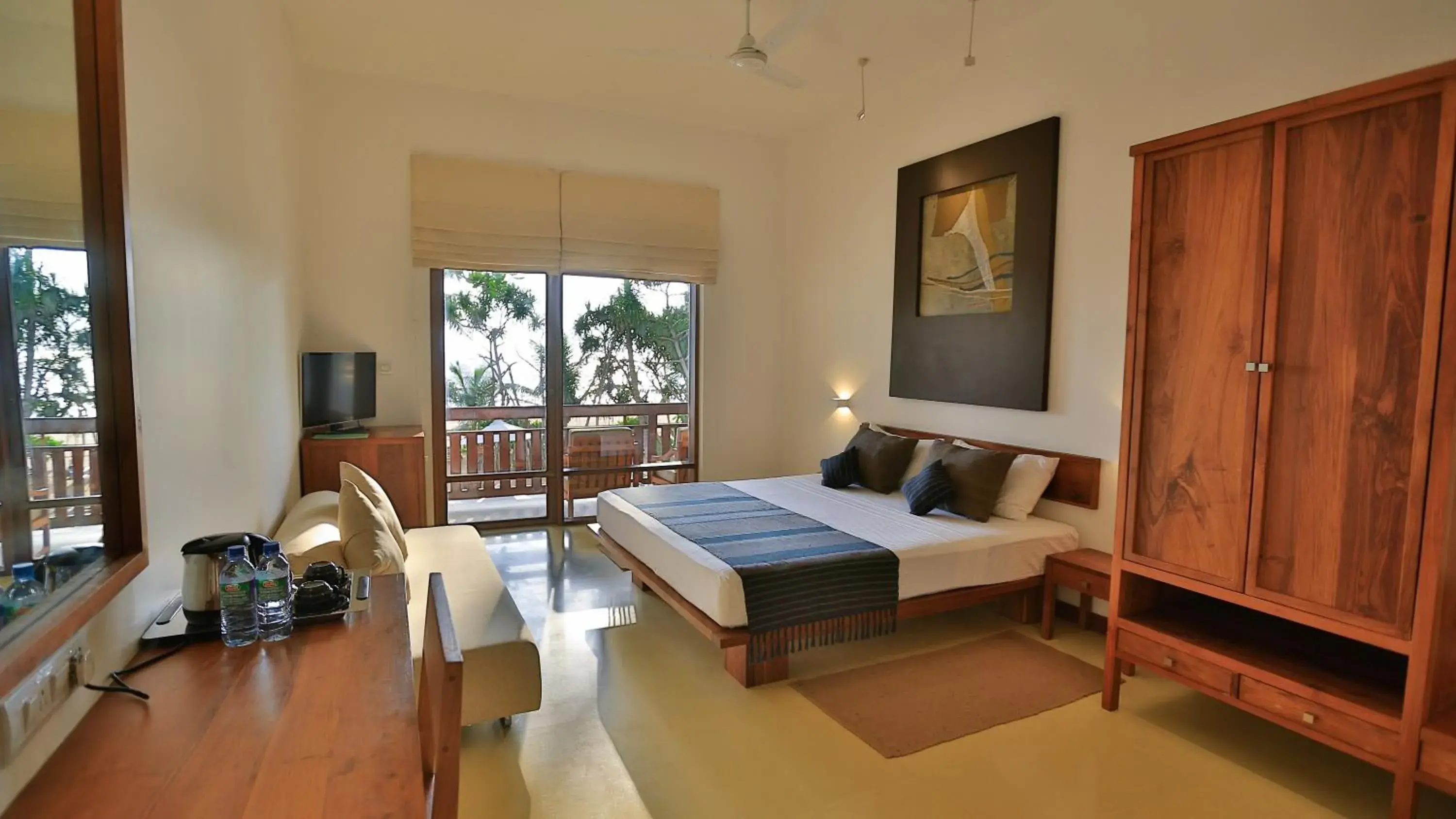 Bed in Pandanus Beach Resort & Spa Bed in Pandanus Beach Resort & Spa