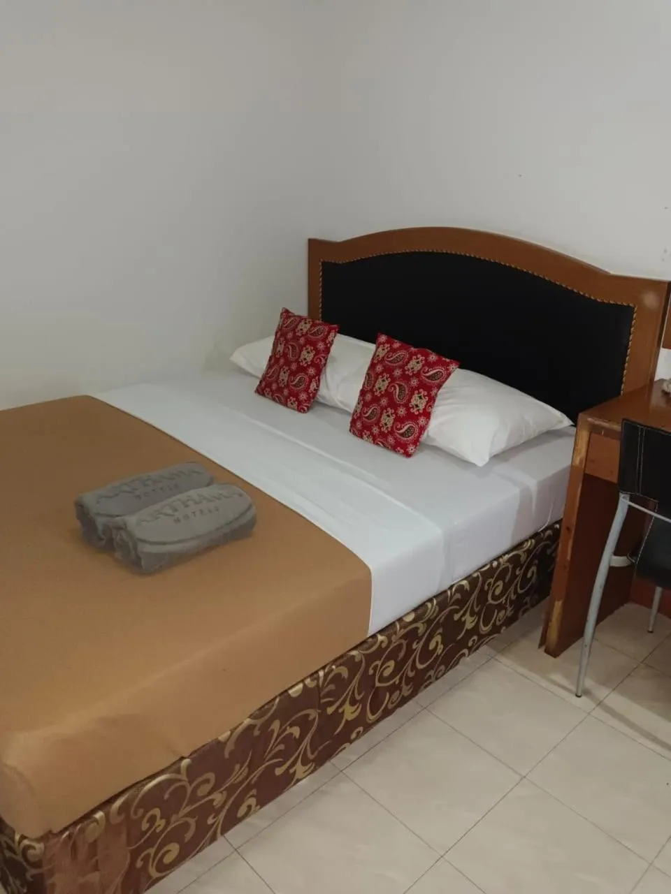 Bed in Karsa Utama Hotel