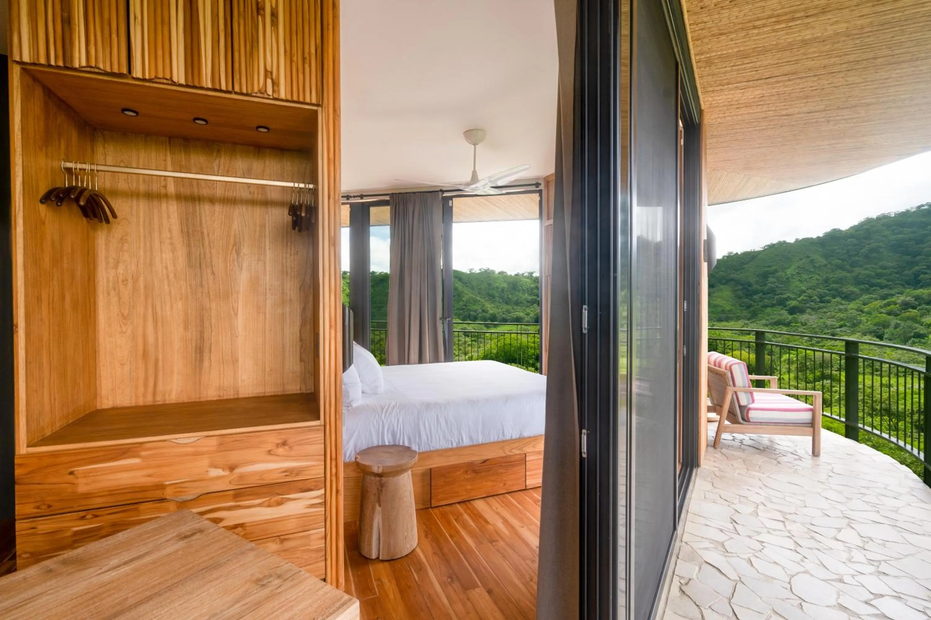 Bed in Suitree Experience Hotel