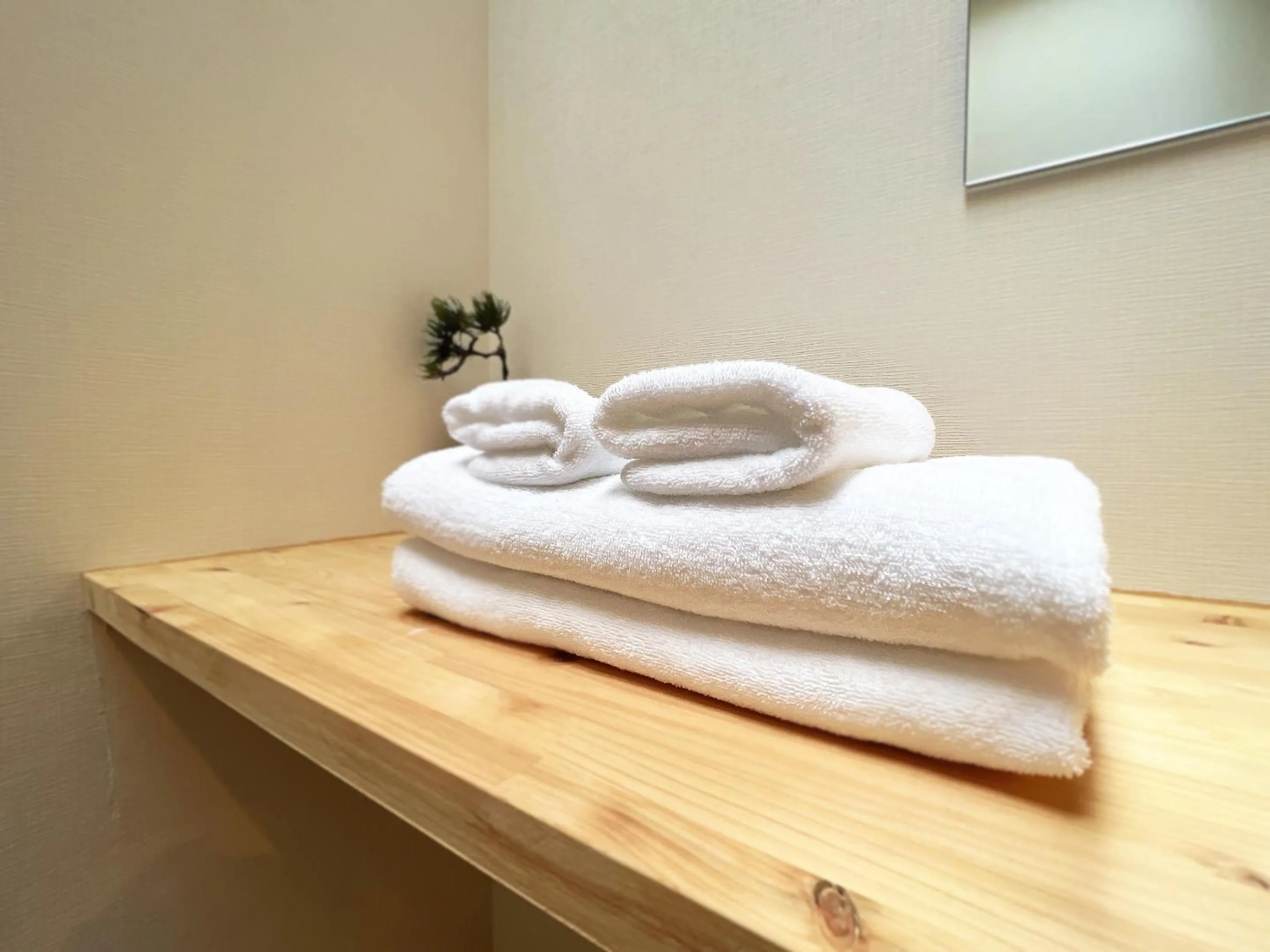 Bed in OWL RESORT ARIFUKU ONSEN