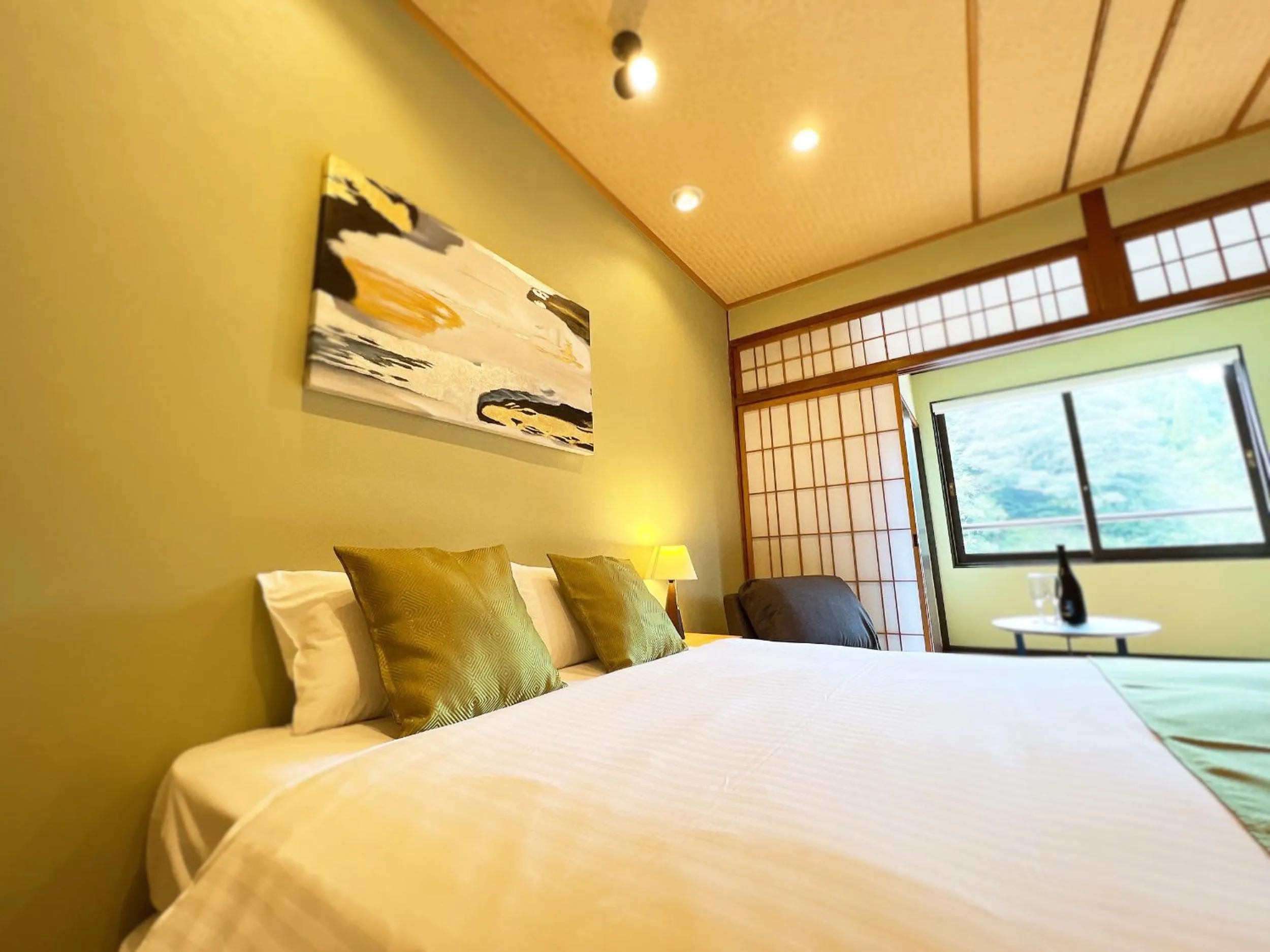 Bed in OWL RESORT ARIFUKU ONSEN