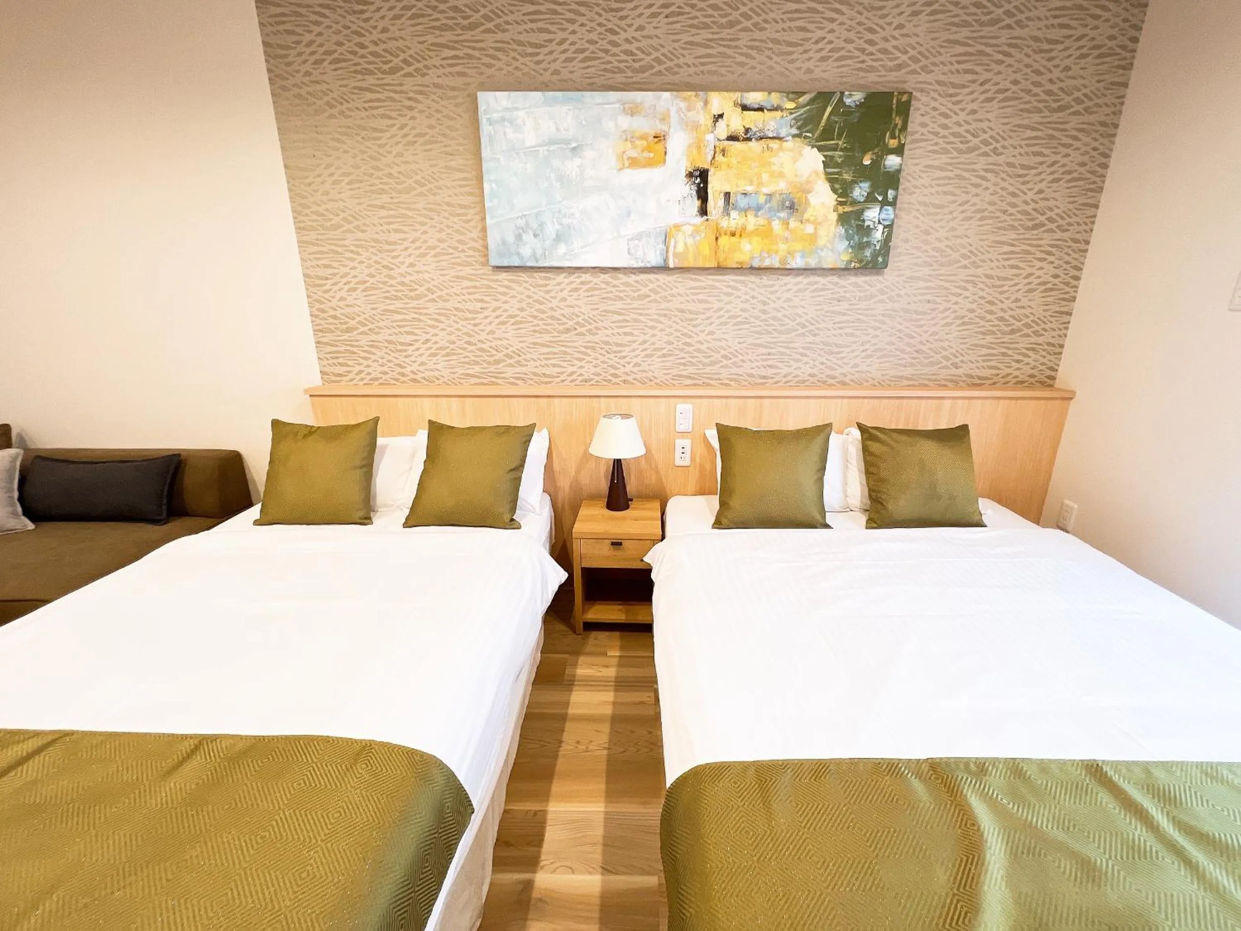 Bed in OWL RESORT ARIFUKU ONSEN