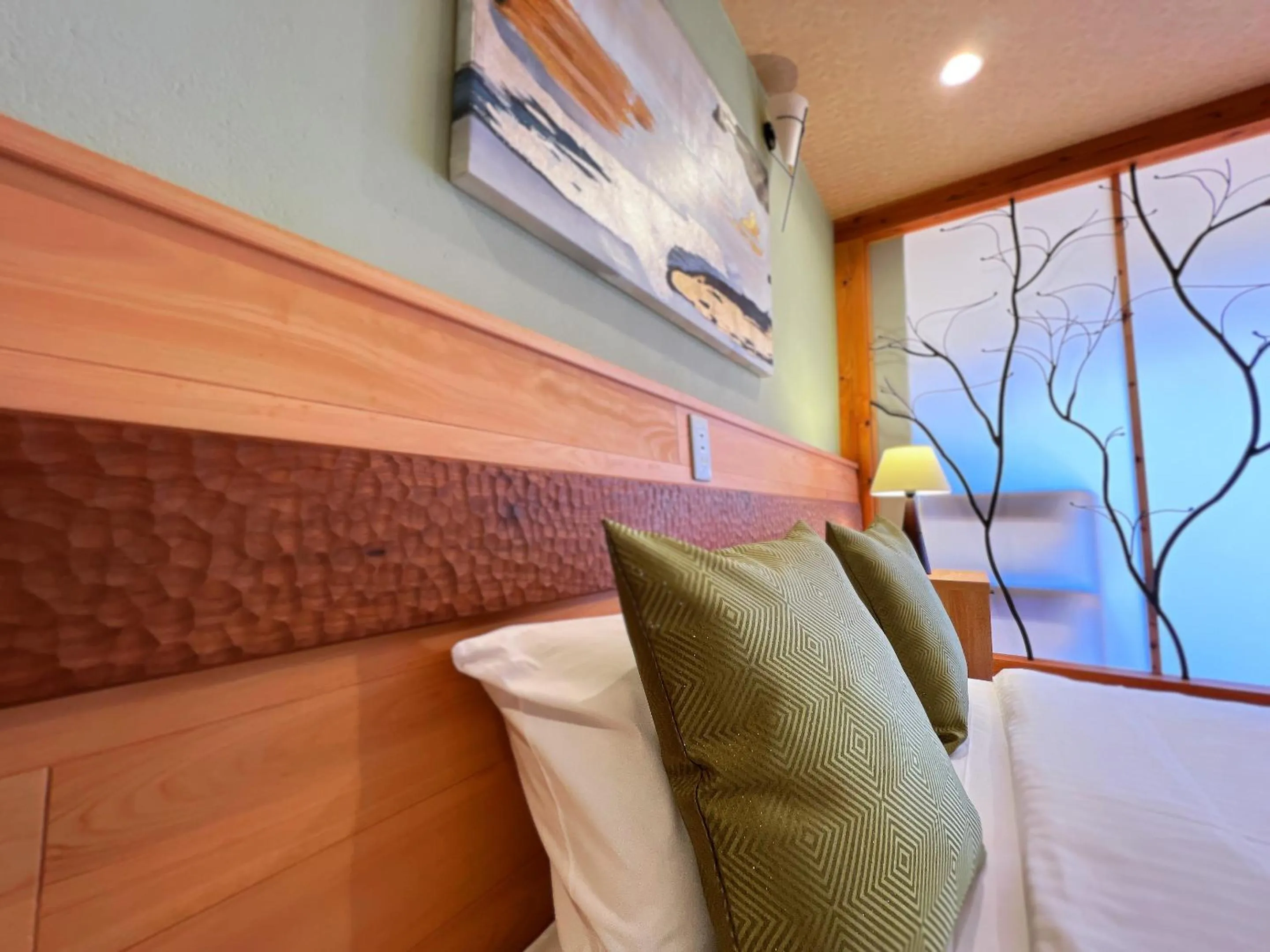 Bed in OWL RESORT ARIFUKU ONSEN