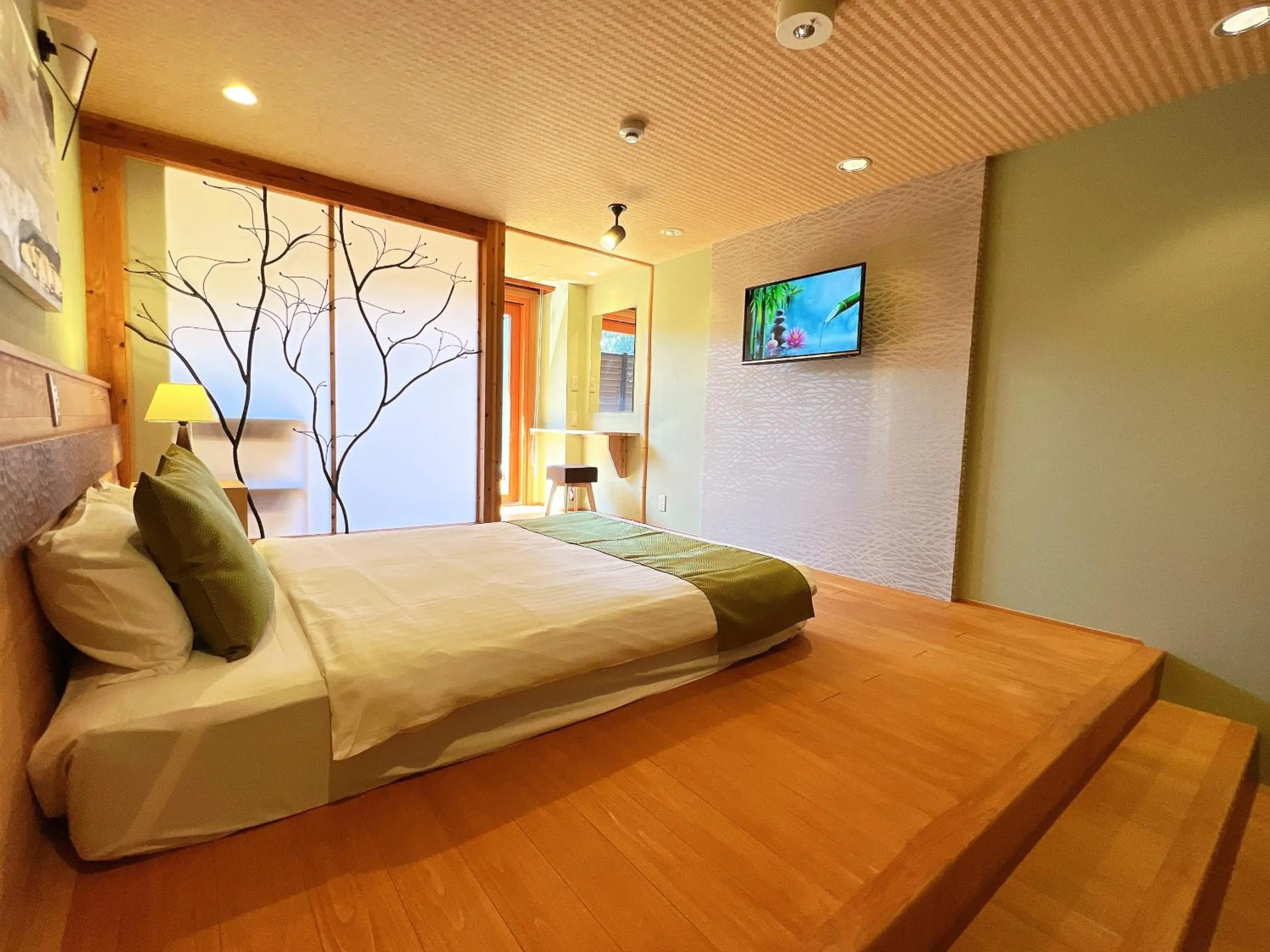 Bed in OWL RESORT ARIFUKU ONSEN