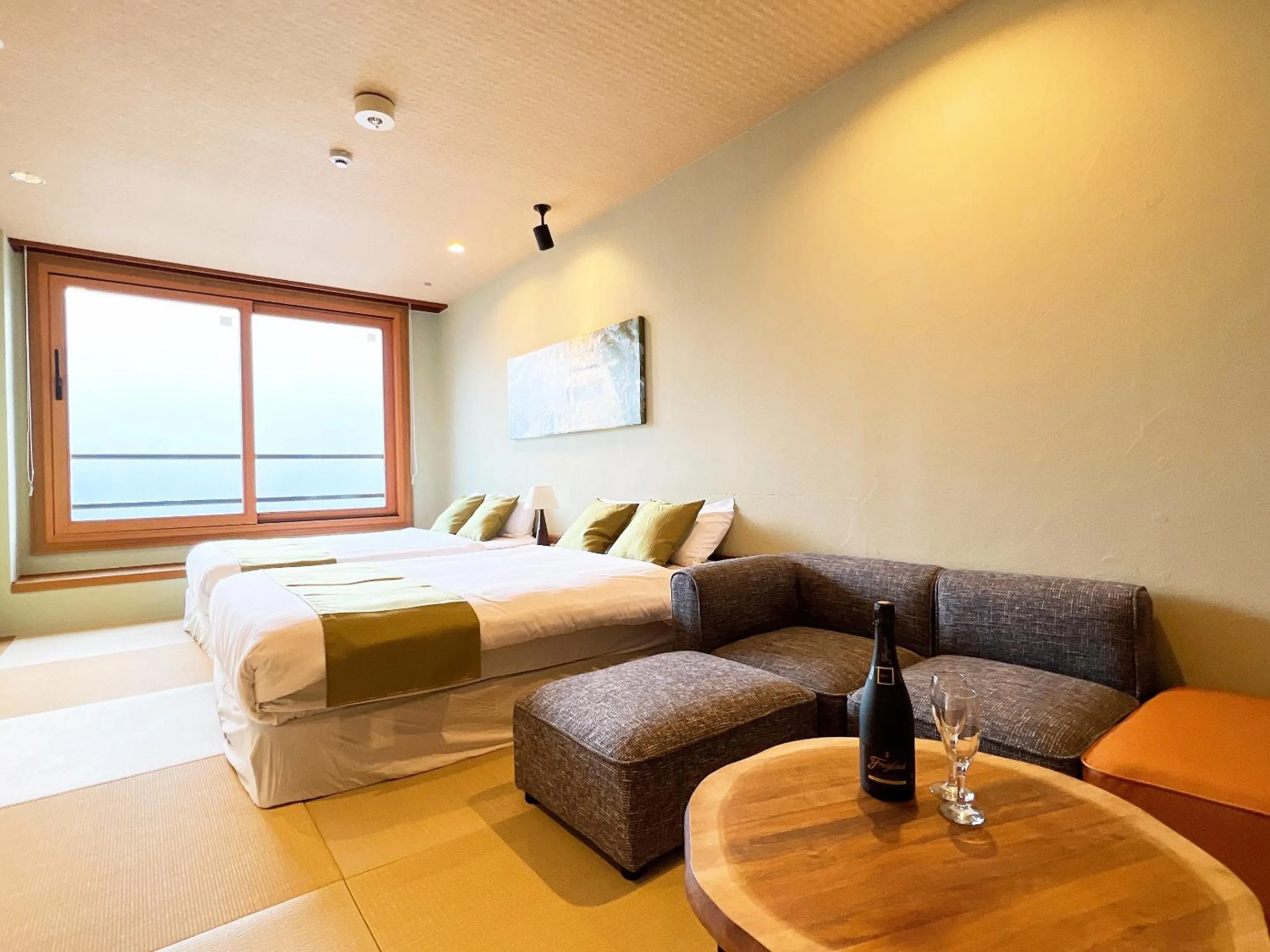 Bed in OWL RESORT ARIFUKU ONSEN