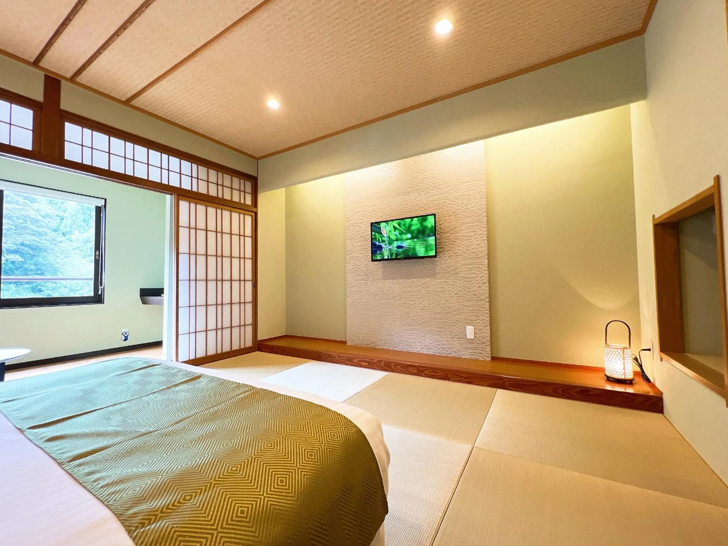 Bed in OWL RESORT ARIFUKU ONSEN
