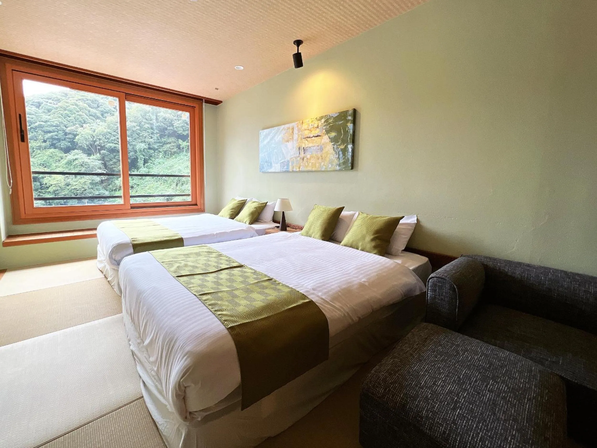 Bed in OWL RESORT ARIFUKU ONSEN