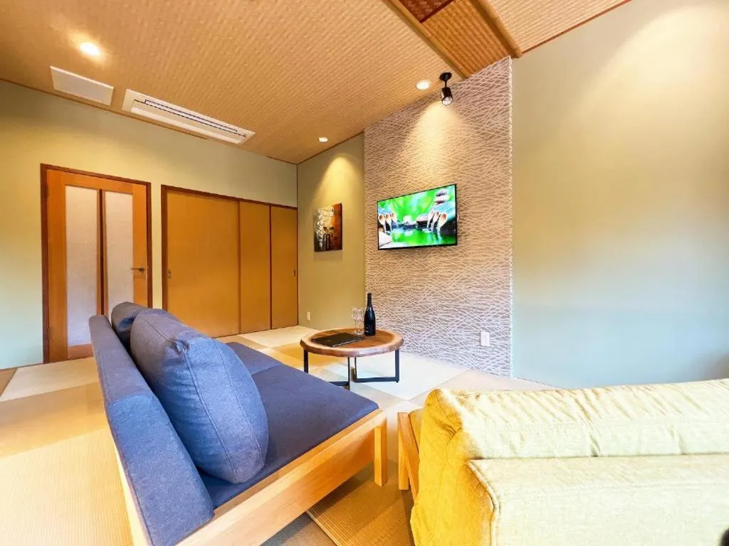 Bed in OWL RESORT ARIFUKU ONSEN