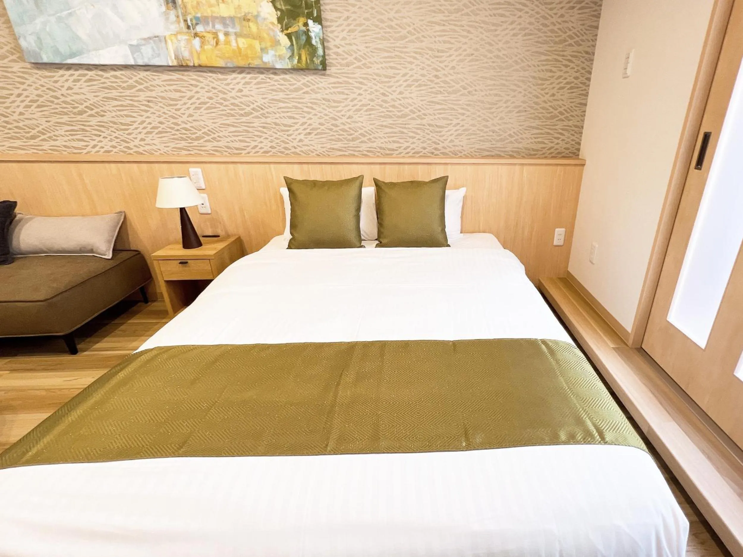 Bed in OWL RESORT ARIFUKU ONSEN