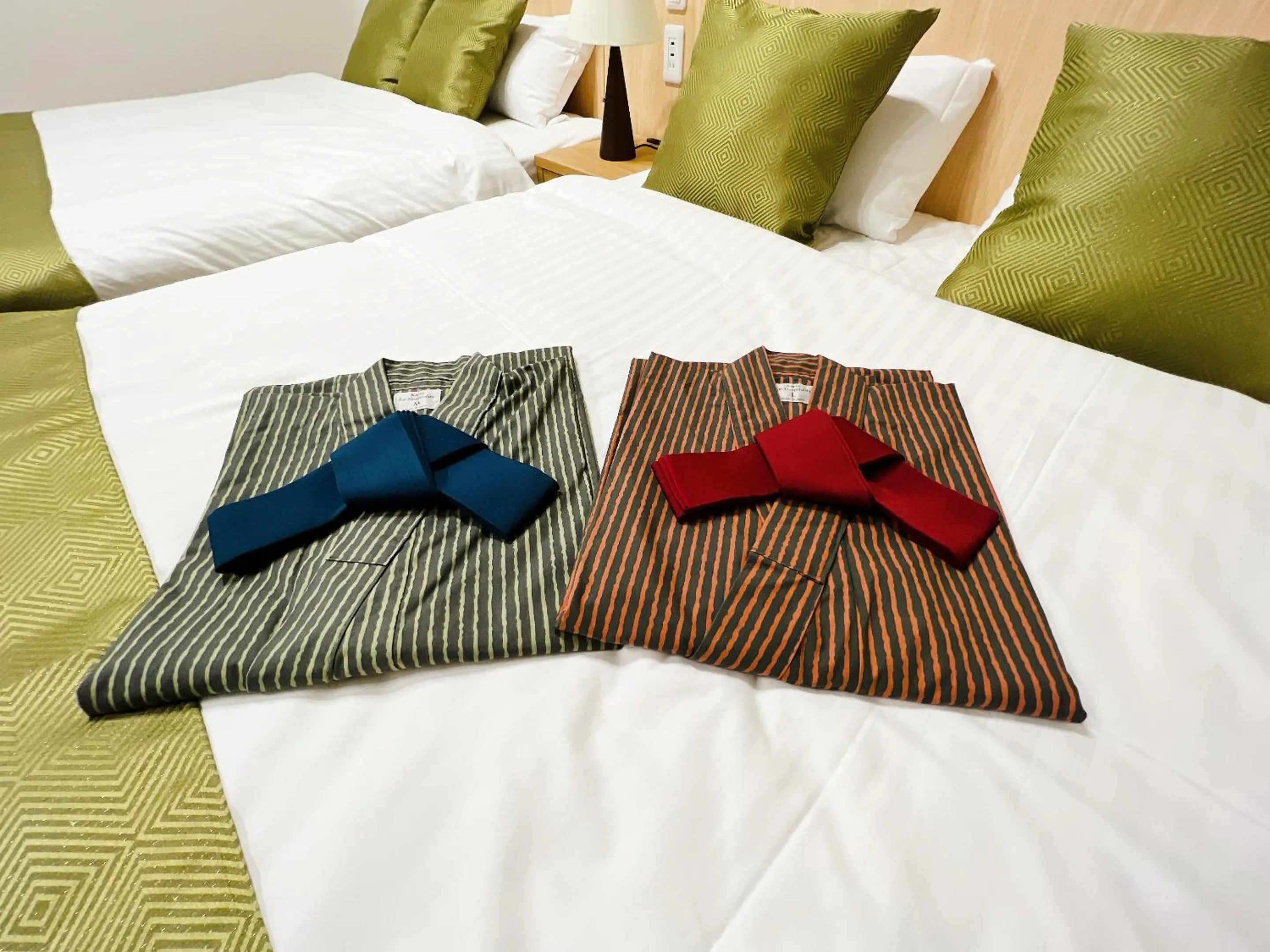 Bed in OWL RESORT ARIFUKU ONSEN