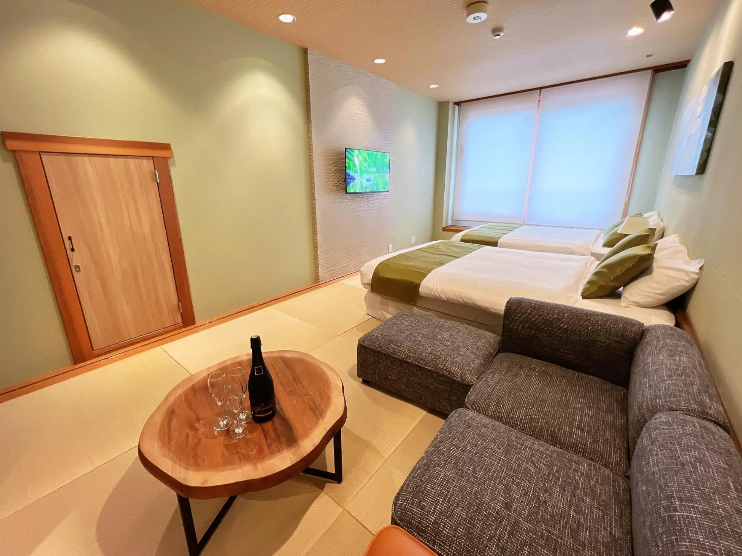 Bed in OWL RESORT ARIFUKU ONSEN