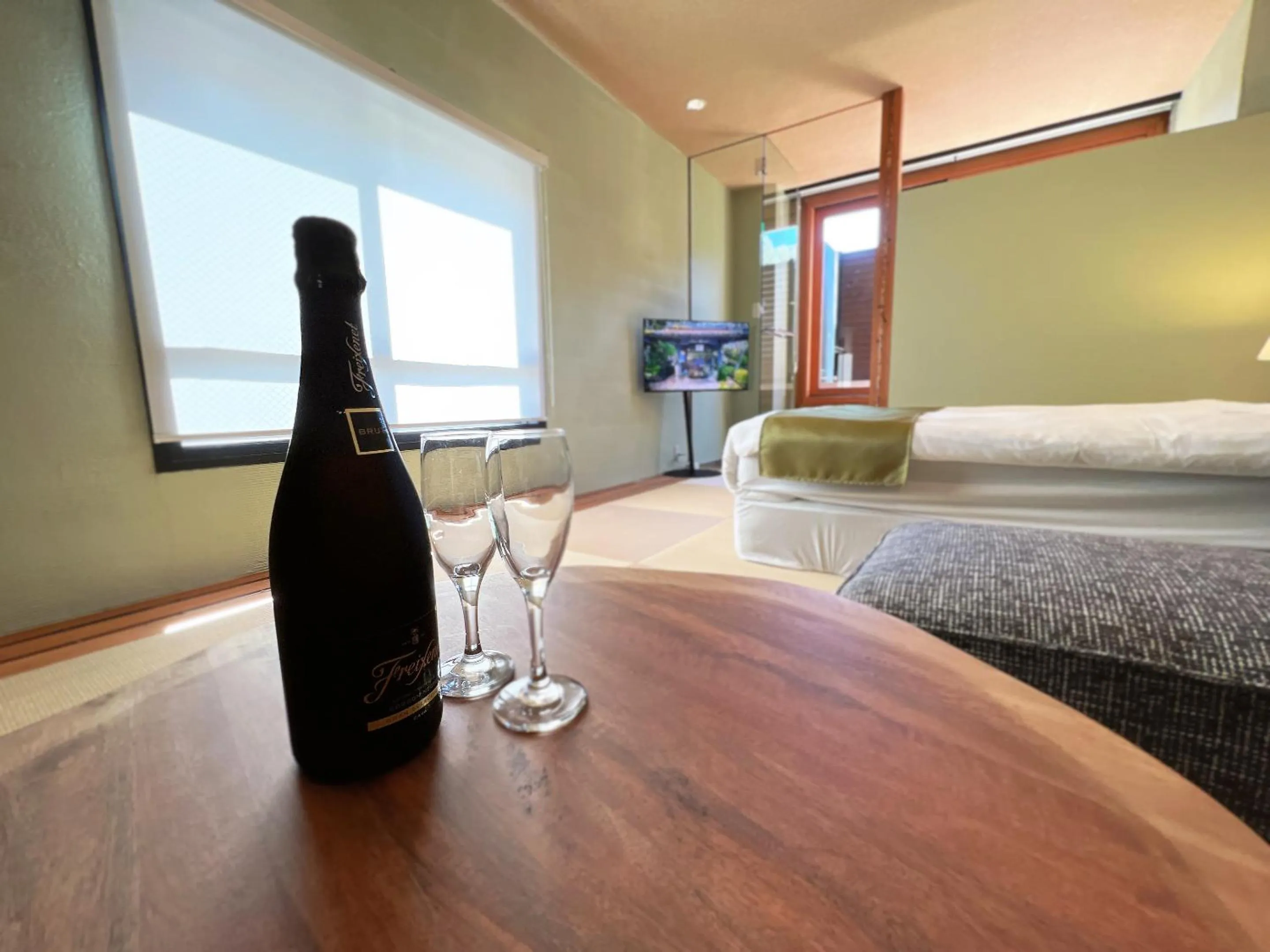 Bed in OWL RESORT ARIFUKU ONSEN