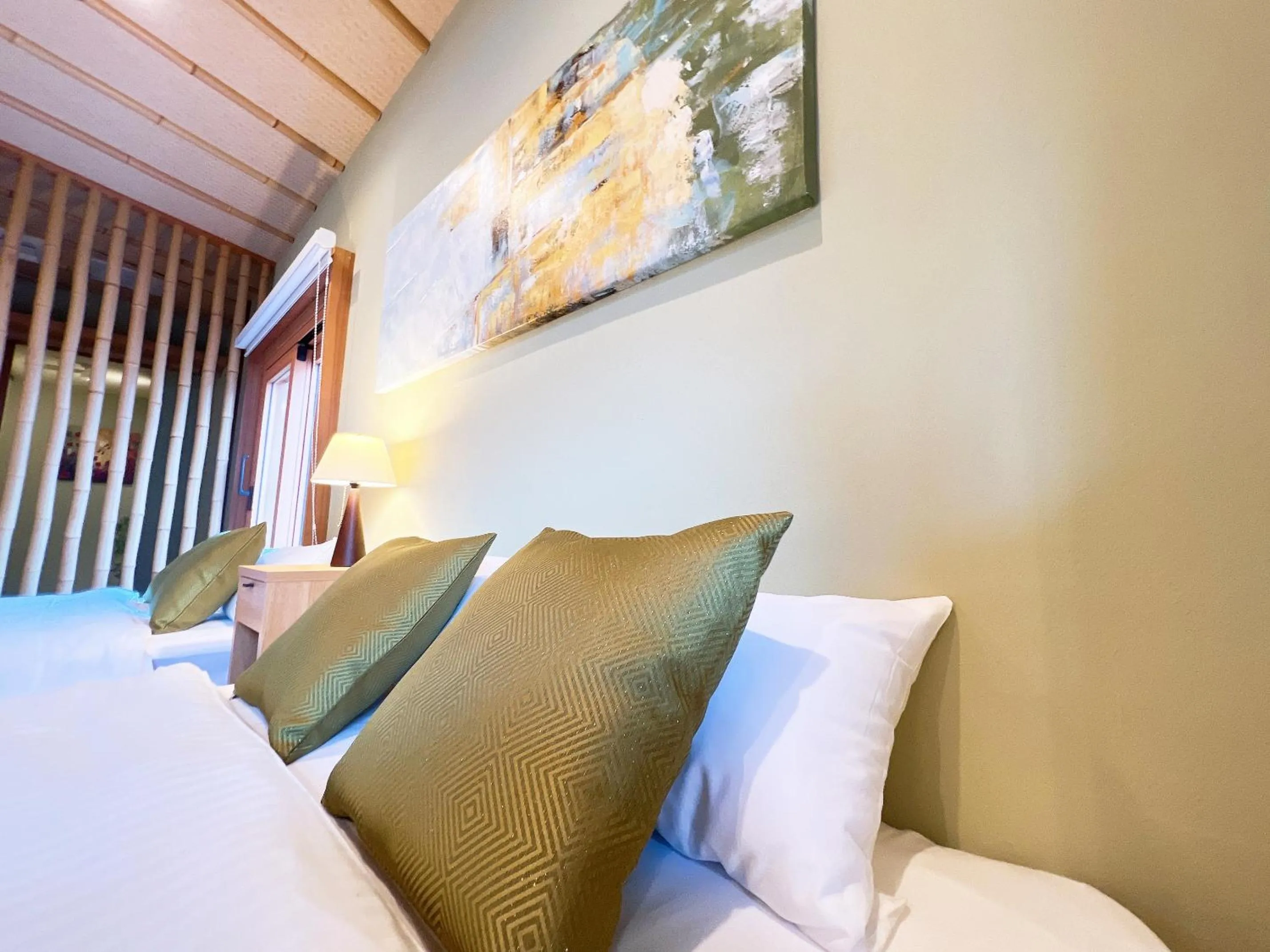 Bed in OWL RESORT ARIFUKU ONSEN