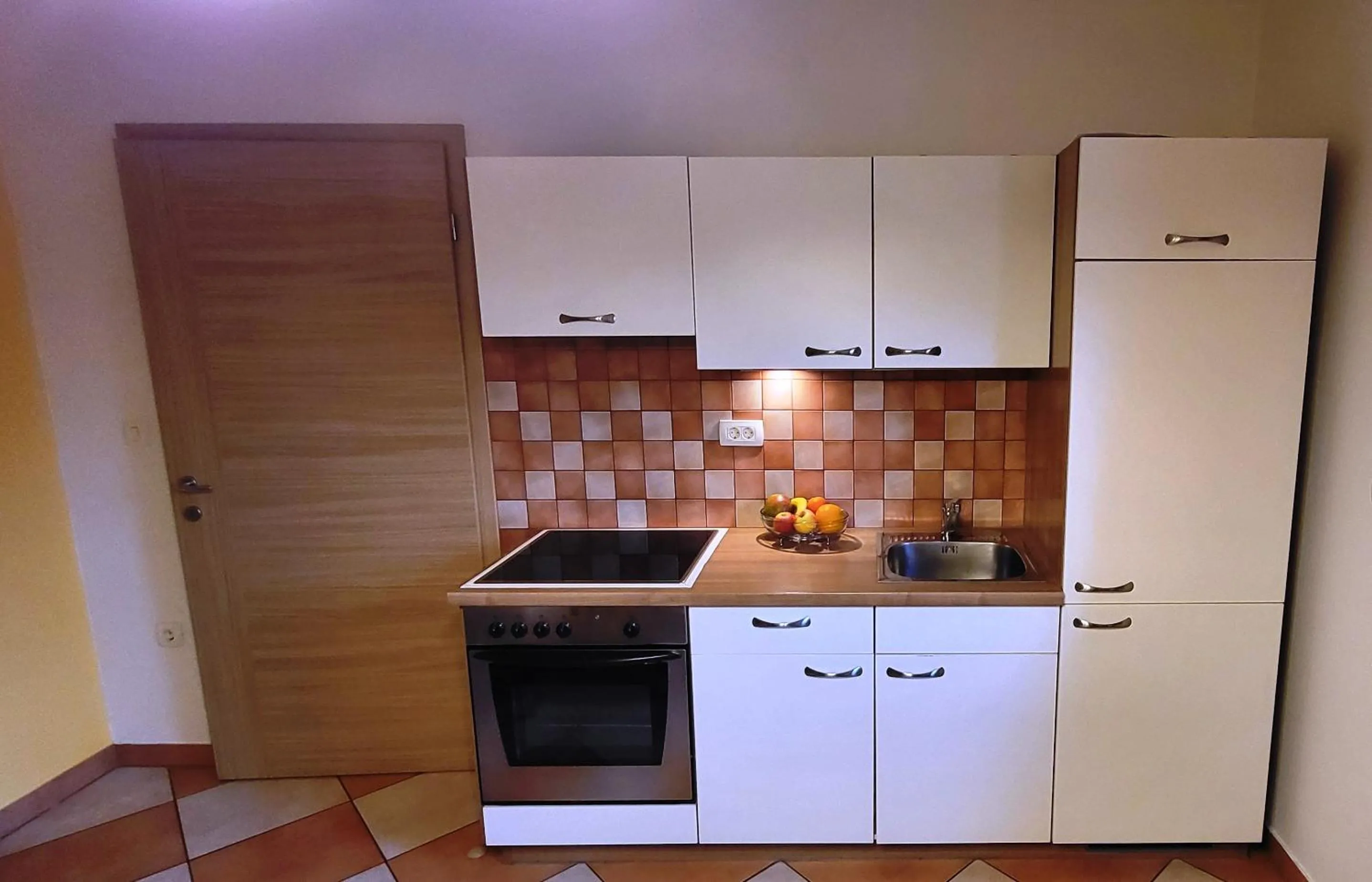 kitchen in Apartments Oman