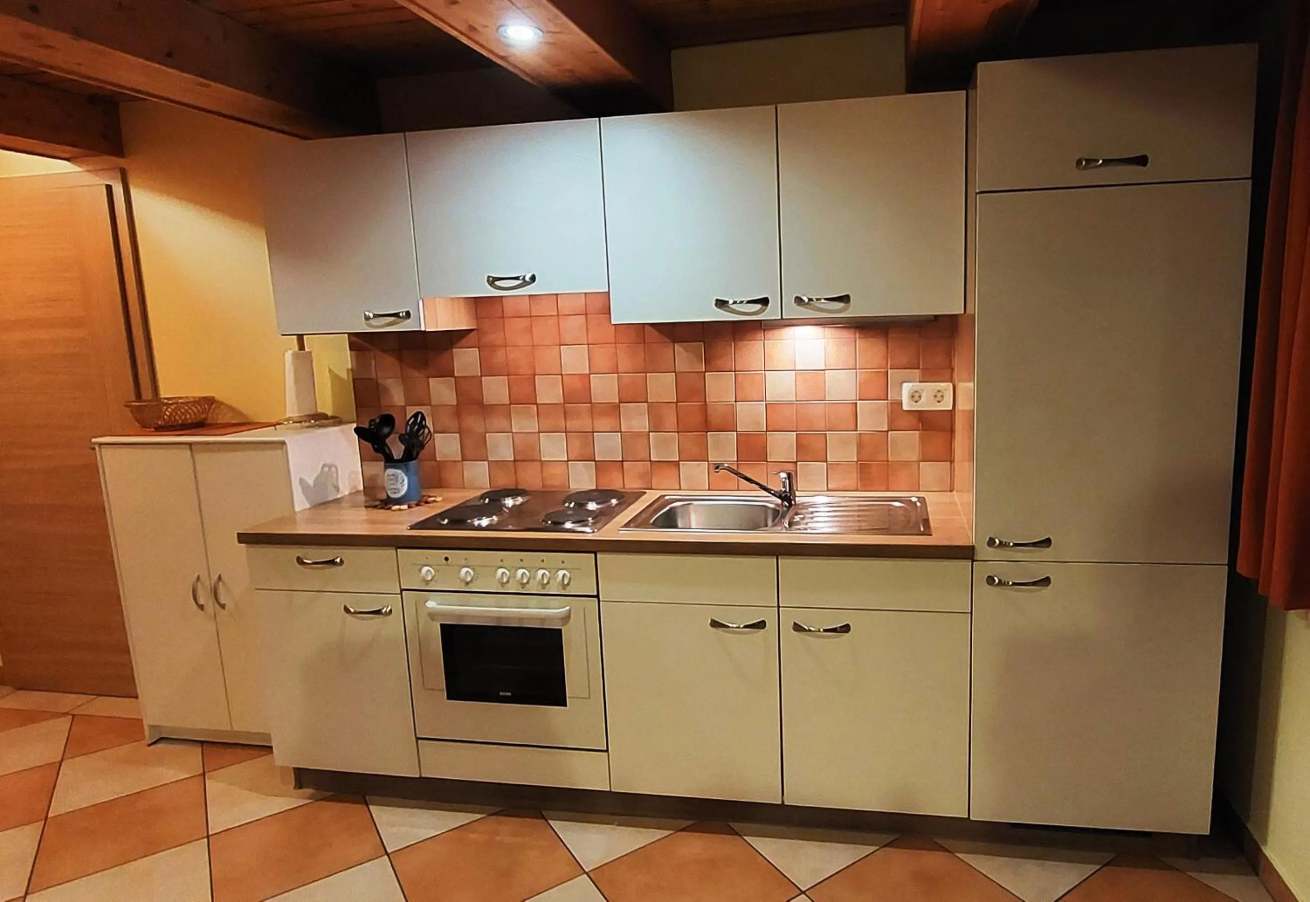 kitchen in Apartments Oman