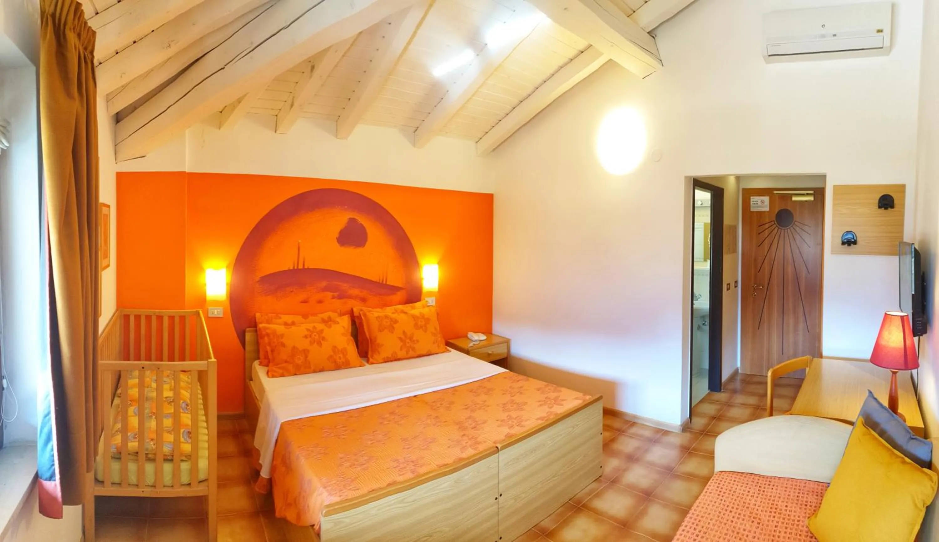 Bed in Family Hotel Primavera