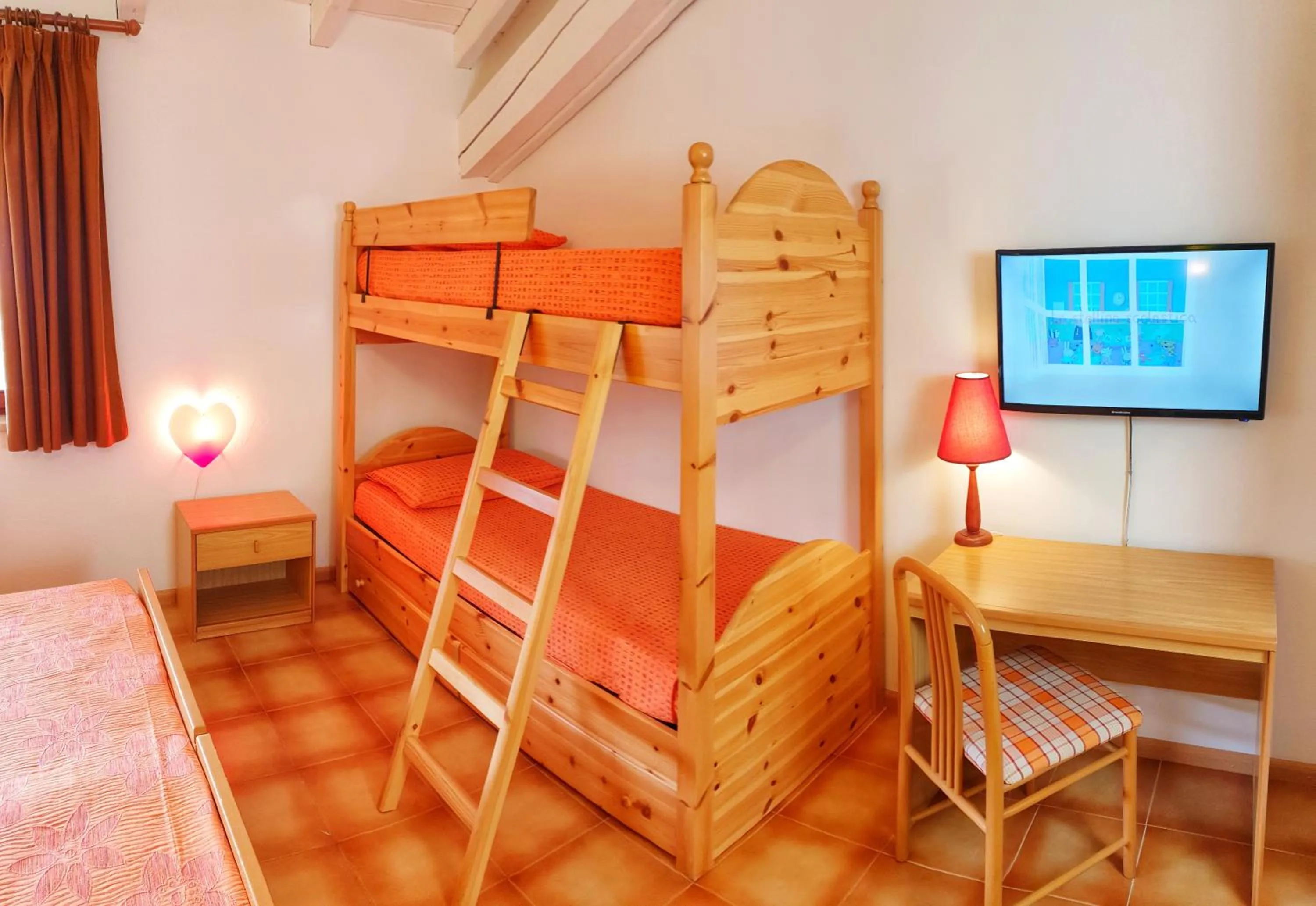 Bed in Family Hotel Primavera