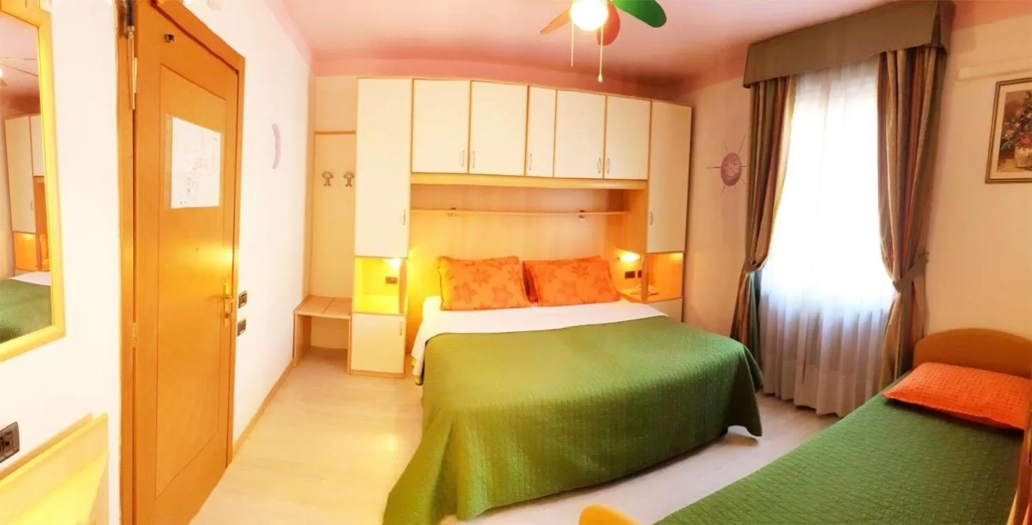 Bed in Family Hotel Primavera