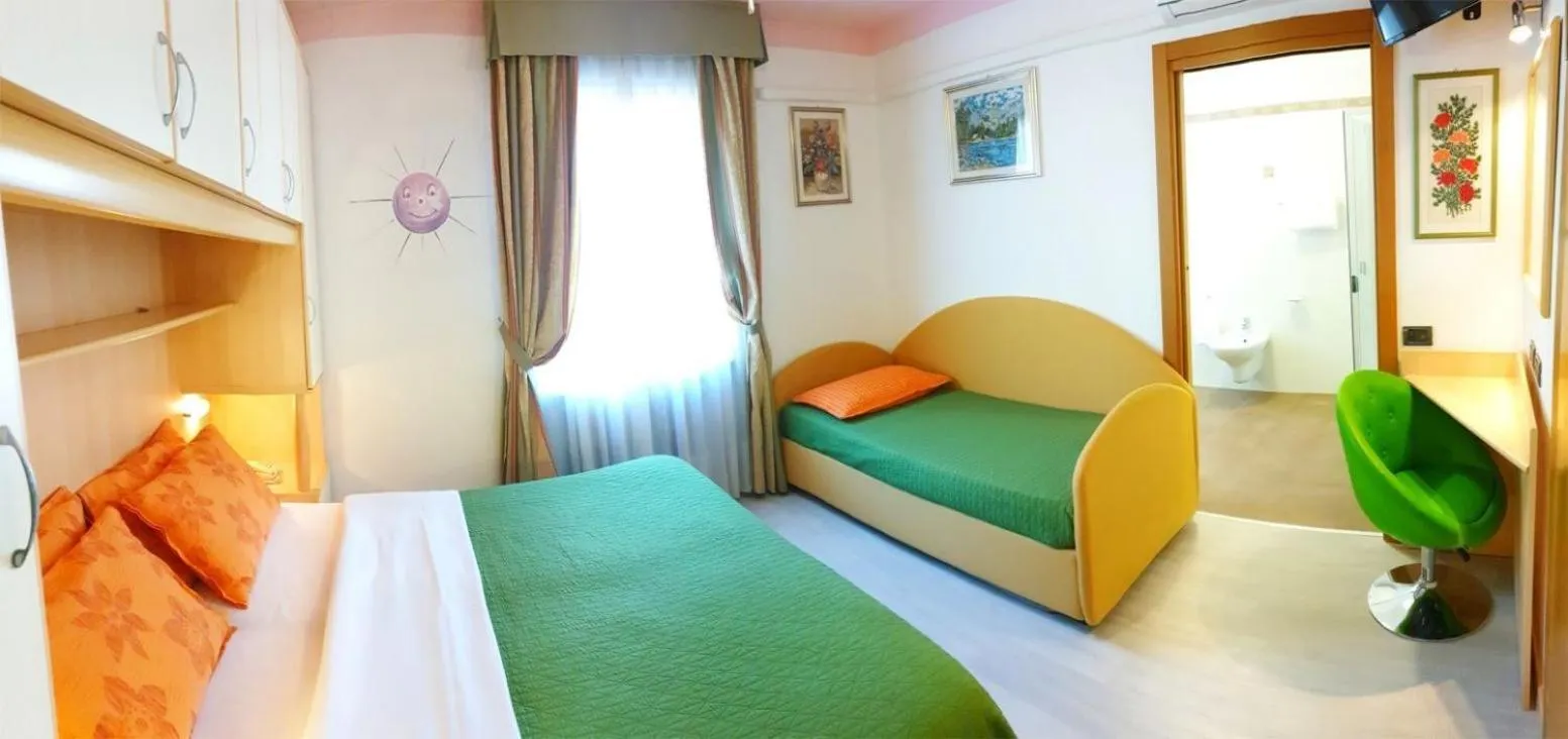 Bed in Family Hotel Primavera