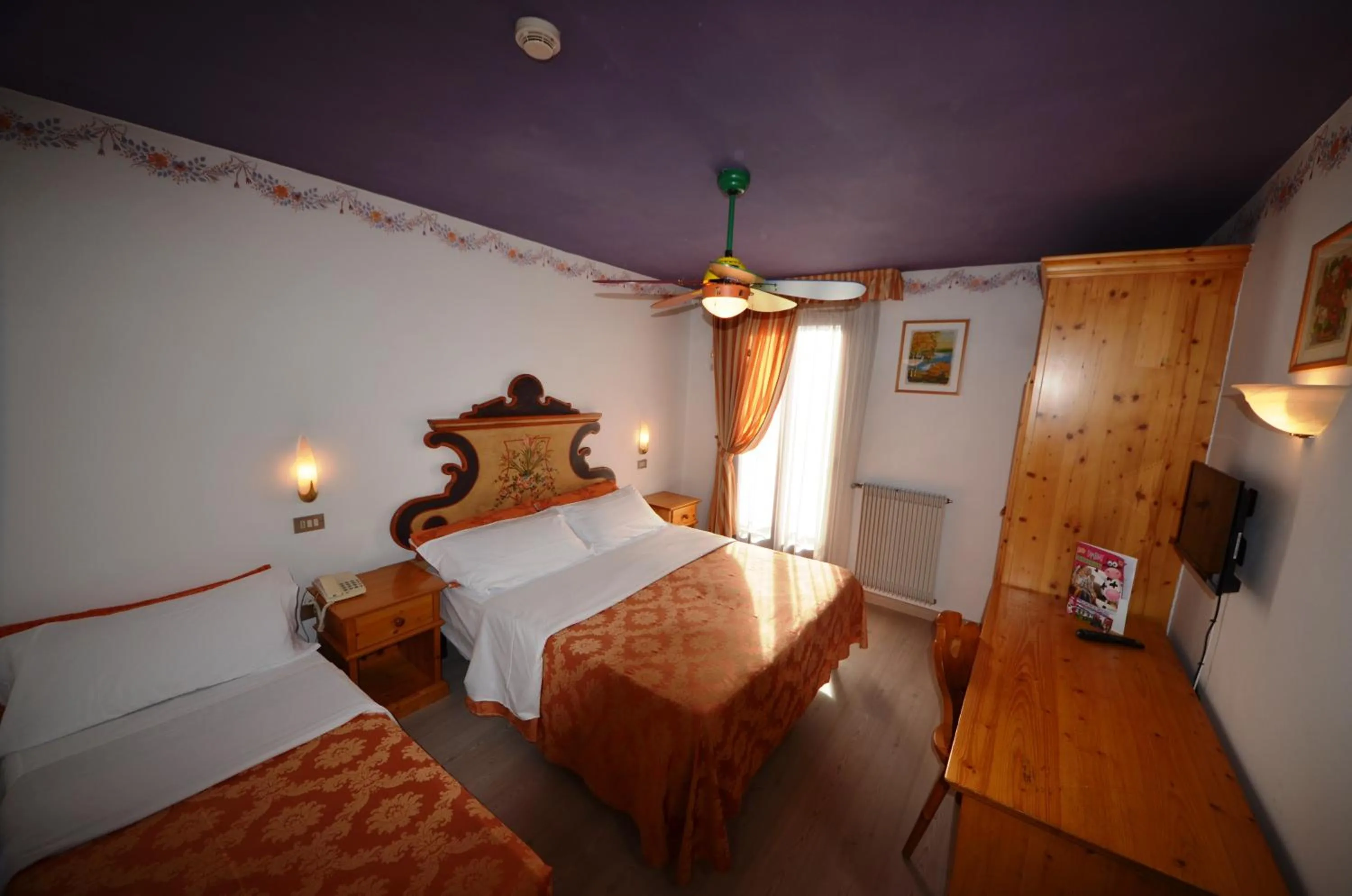 Bed in Family Hotel Primavera