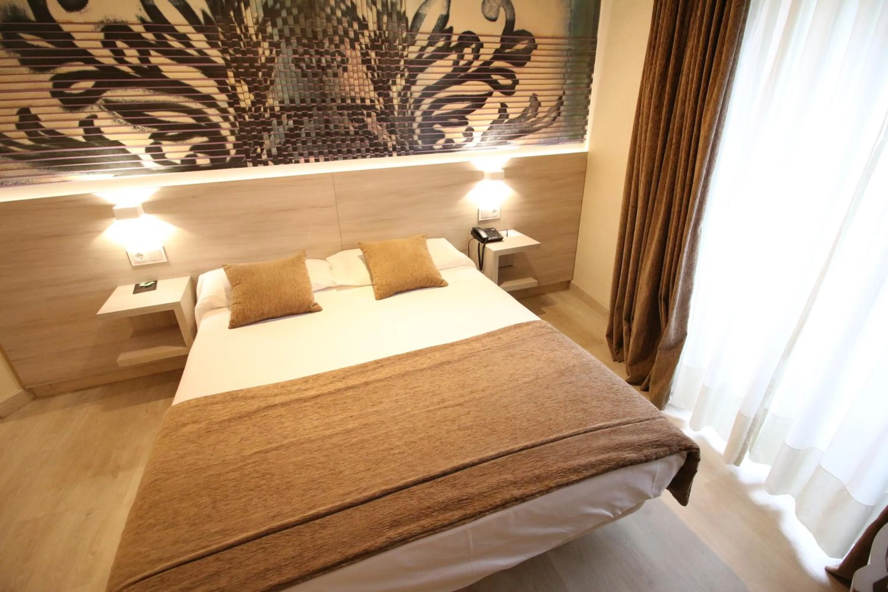 Bed in Hotel Alda San Carlos