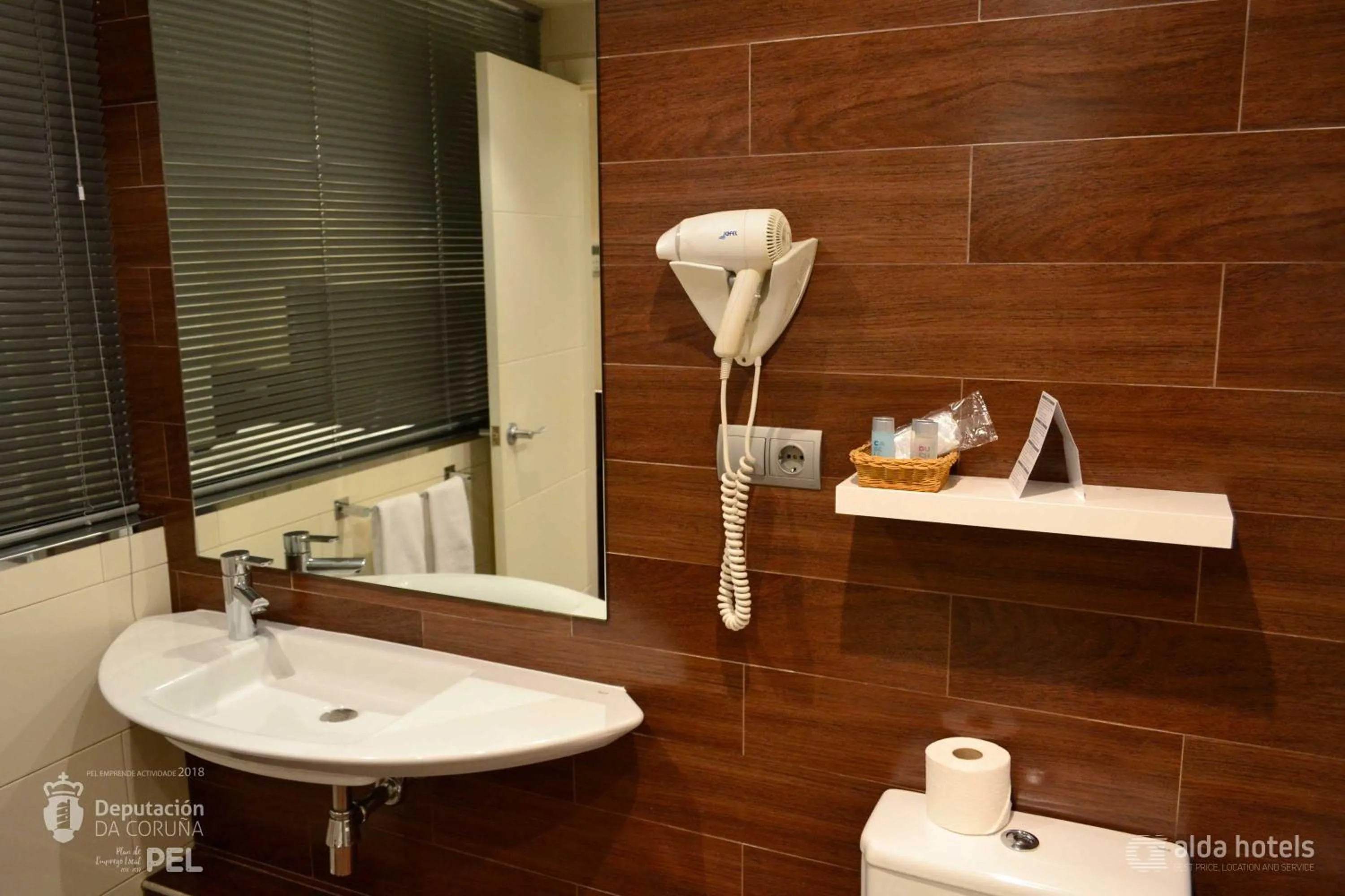 Bathroom in Hotel Alda San Carlos