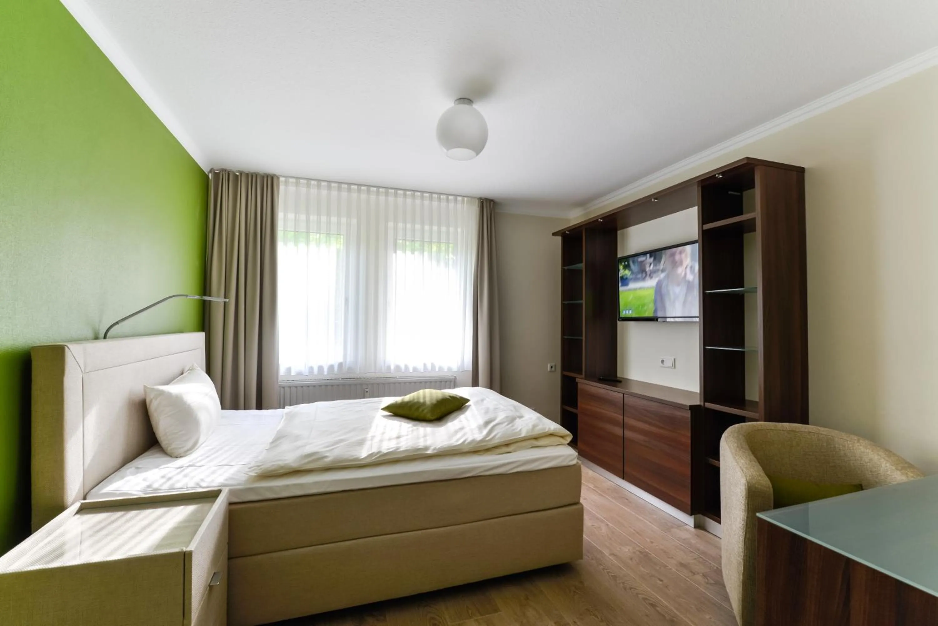 Photo of the whole room, Bed in Hotel am Herkules