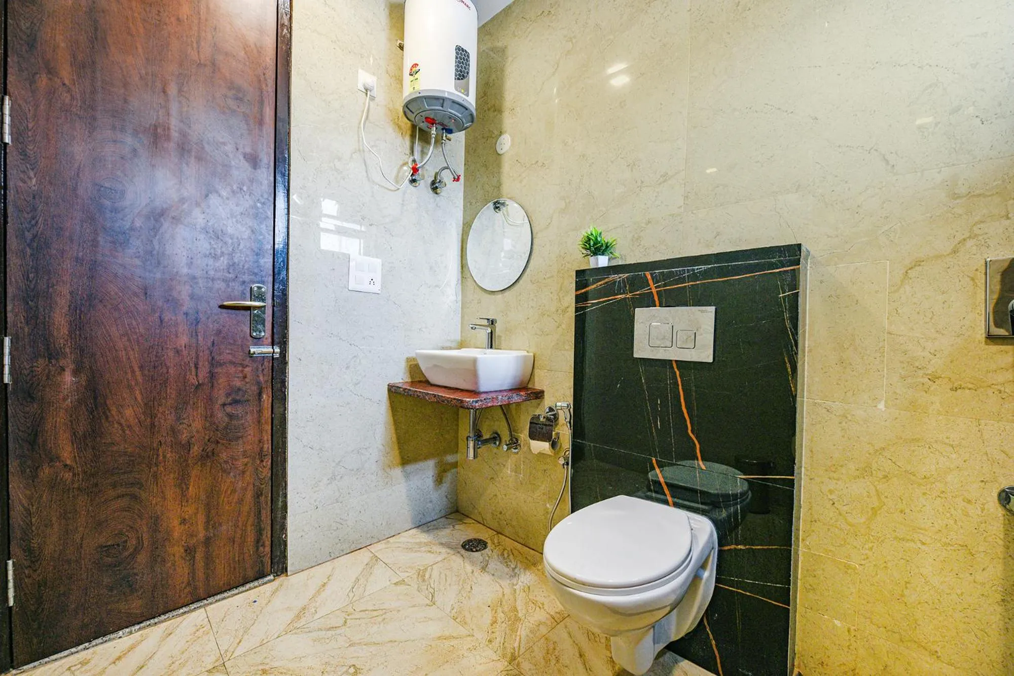 Bathroom in FabHotel Jaswinder Bhawan