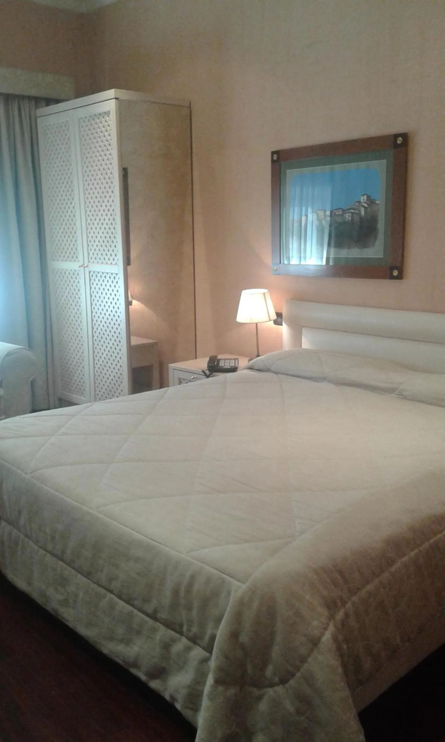 Bed in Colosseo Studio Suite