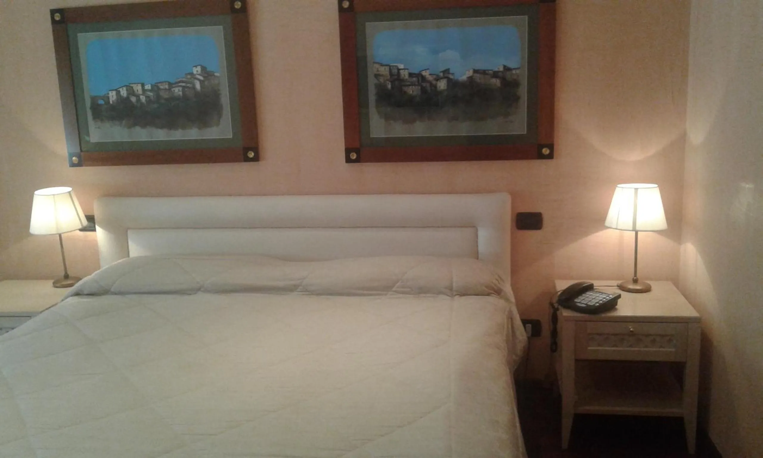 Bed in Colosseo Studio Suite