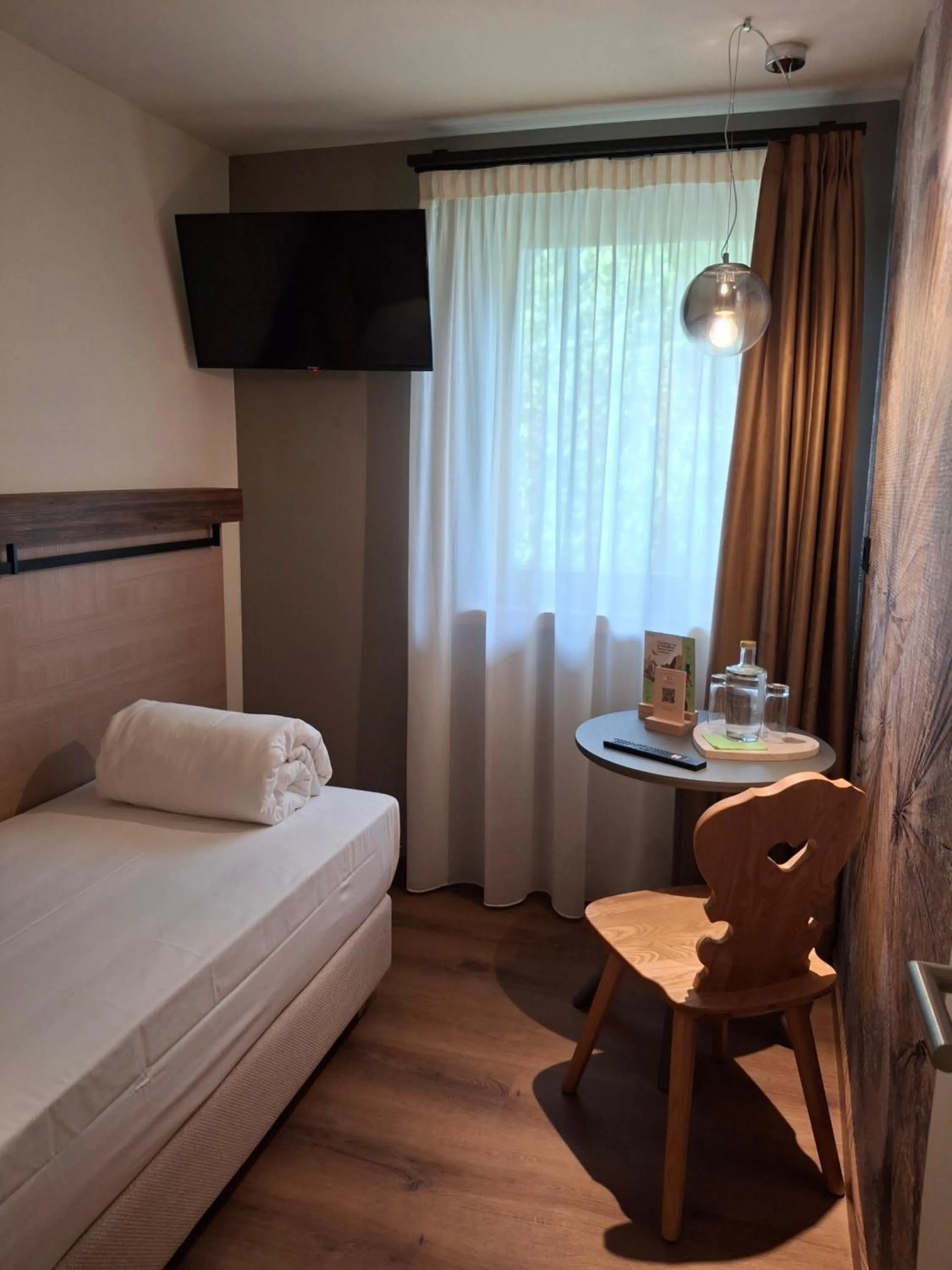 Bed in Hotel Dolomiti Saone