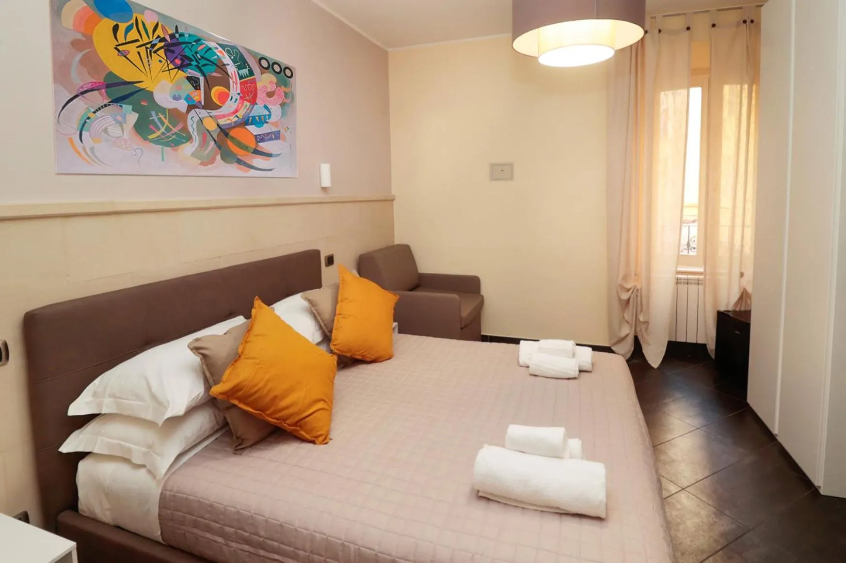 Bed in Cardinal Vatican Inn