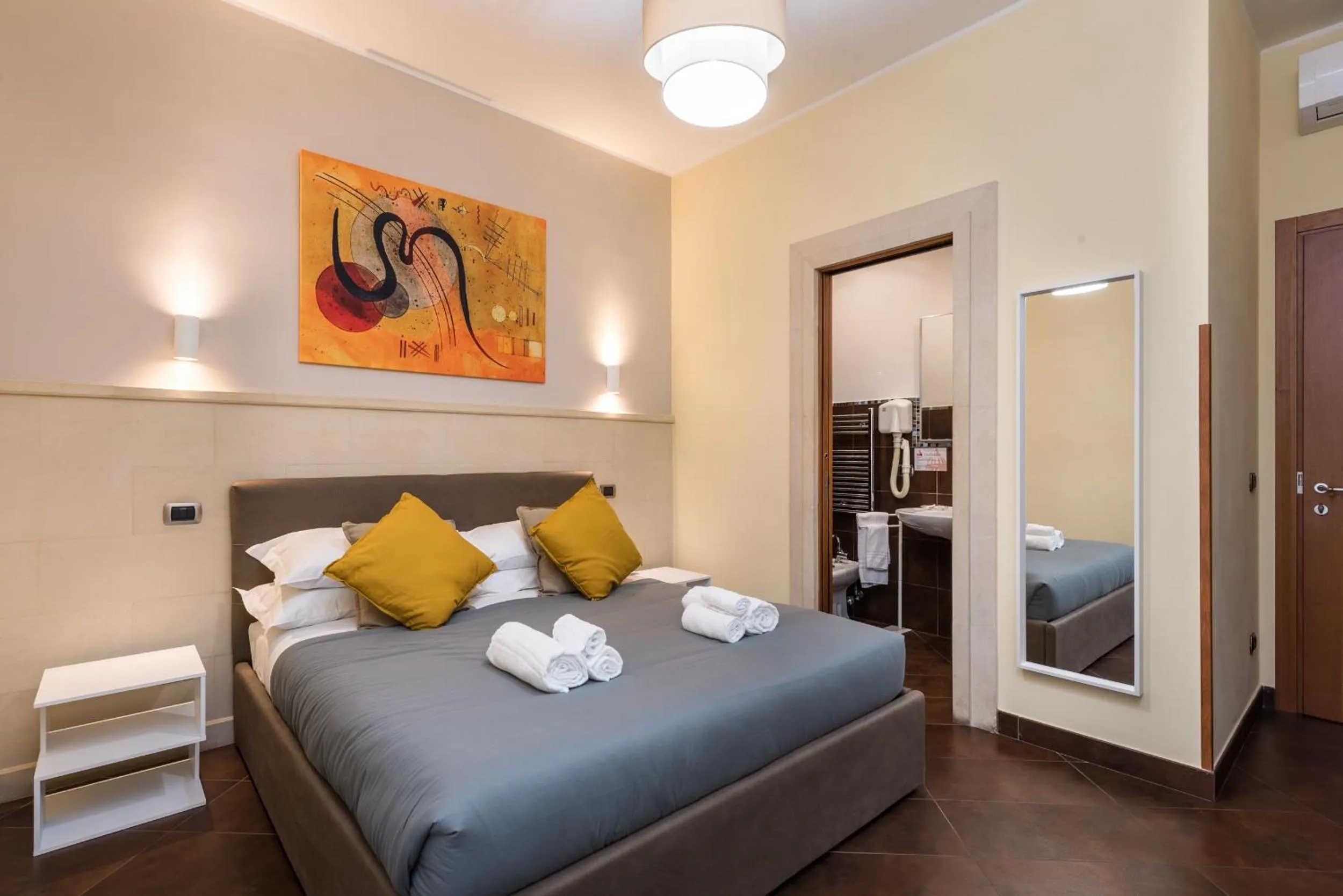 Bed in Cardinal Vatican Inn