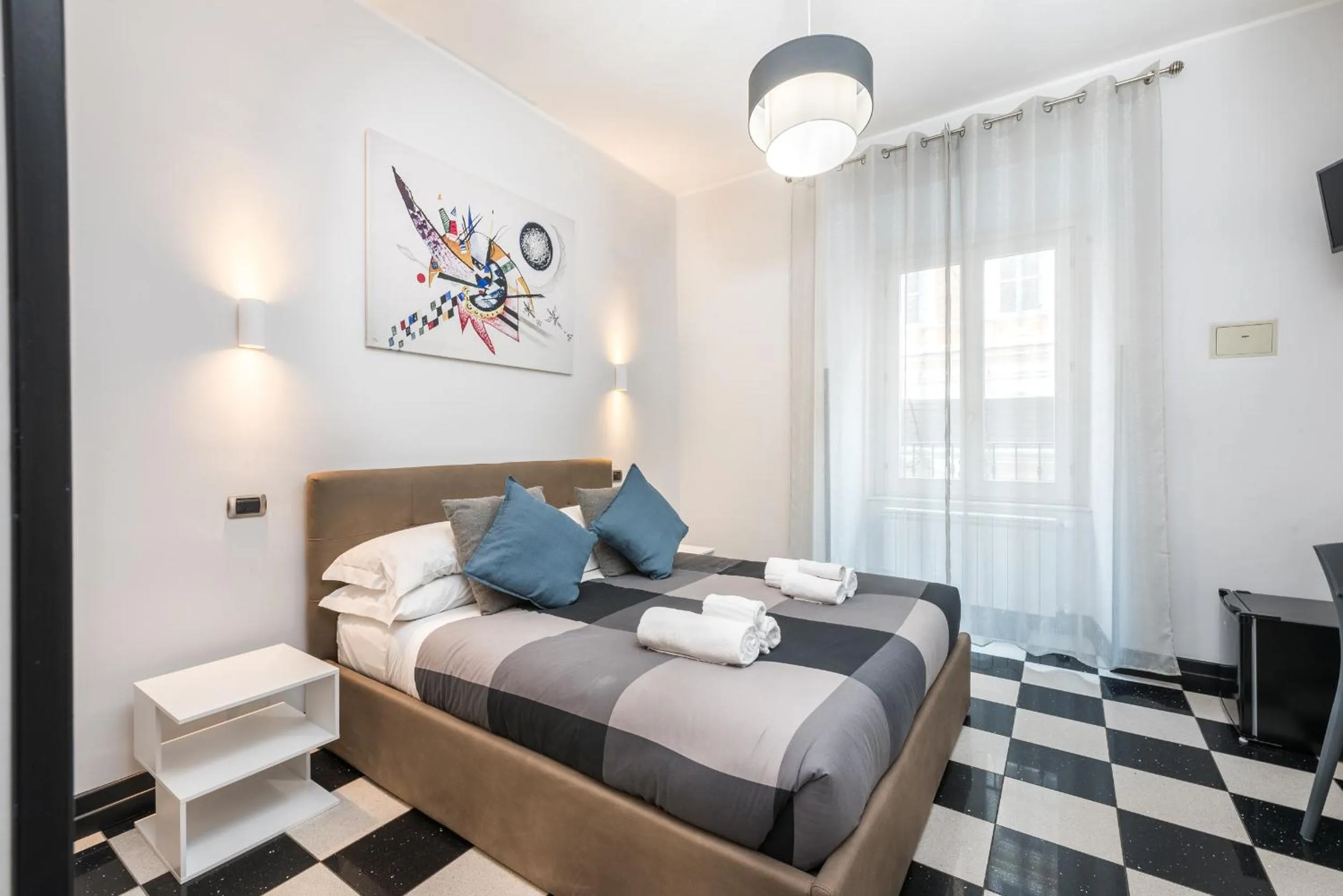 Bed in Cardinal Vatican Inn