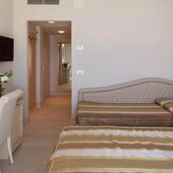 Bed in Hotel Conchiglia