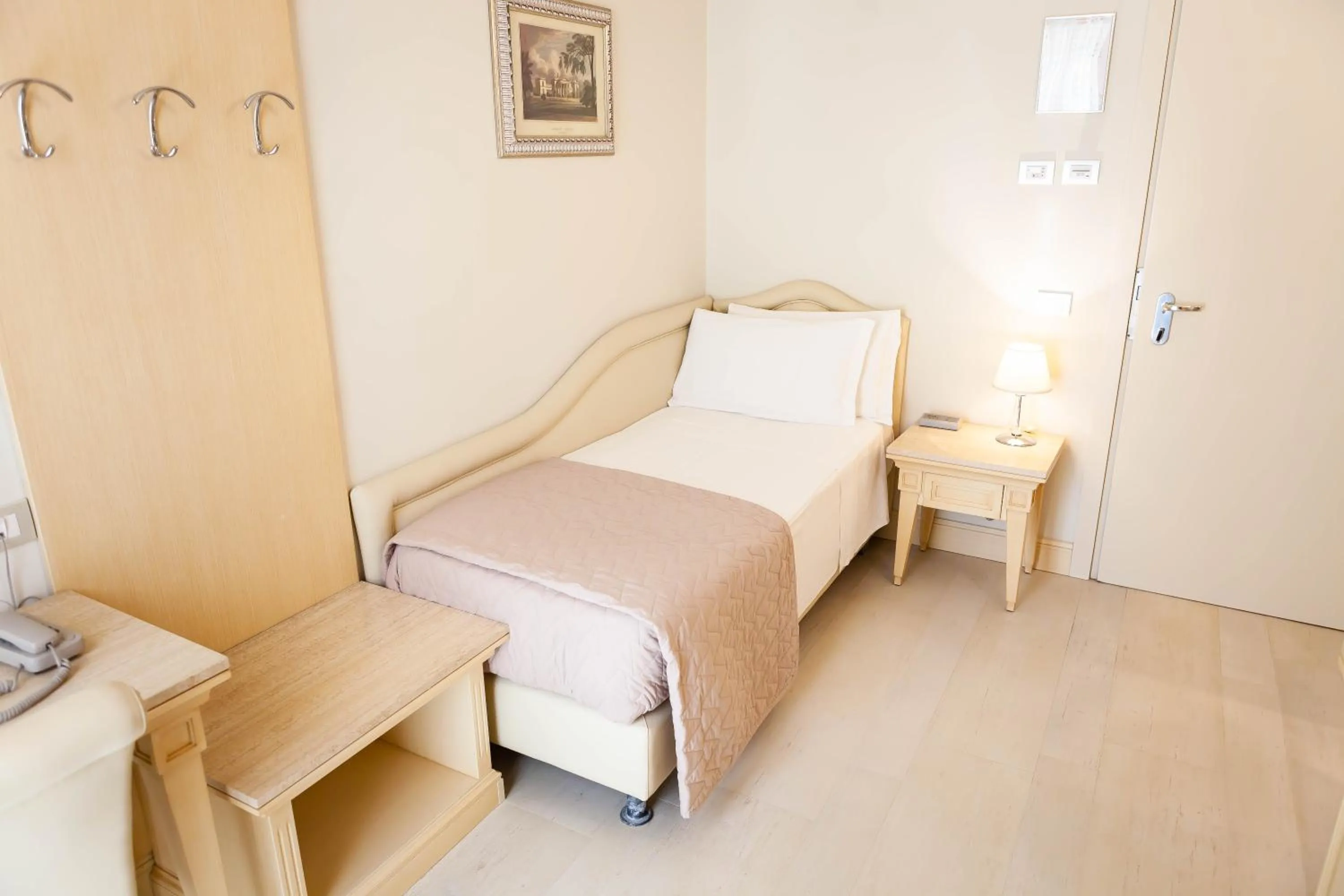 Bed in Hotel Conchiglia