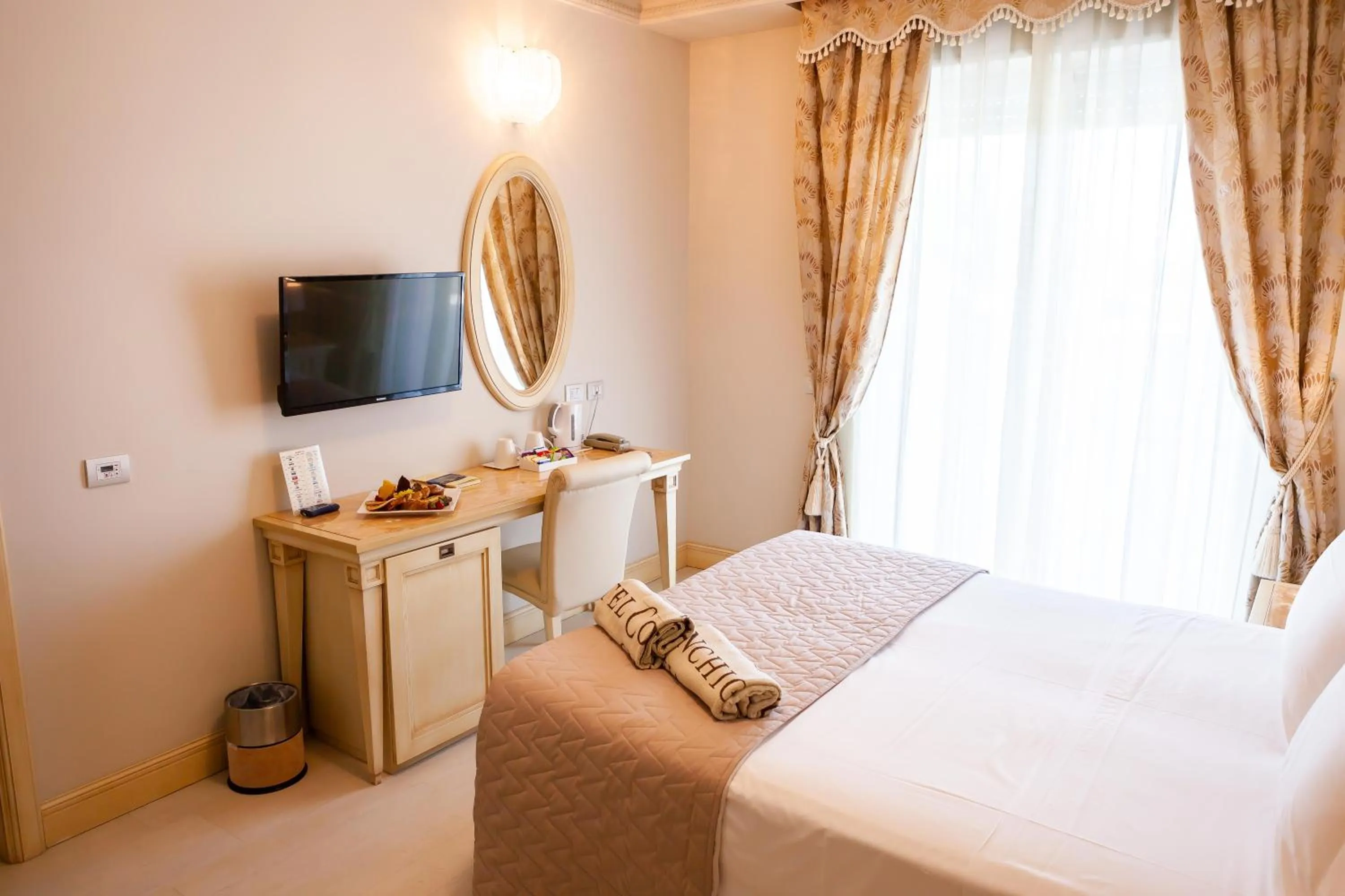 Bed in Hotel Conchiglia