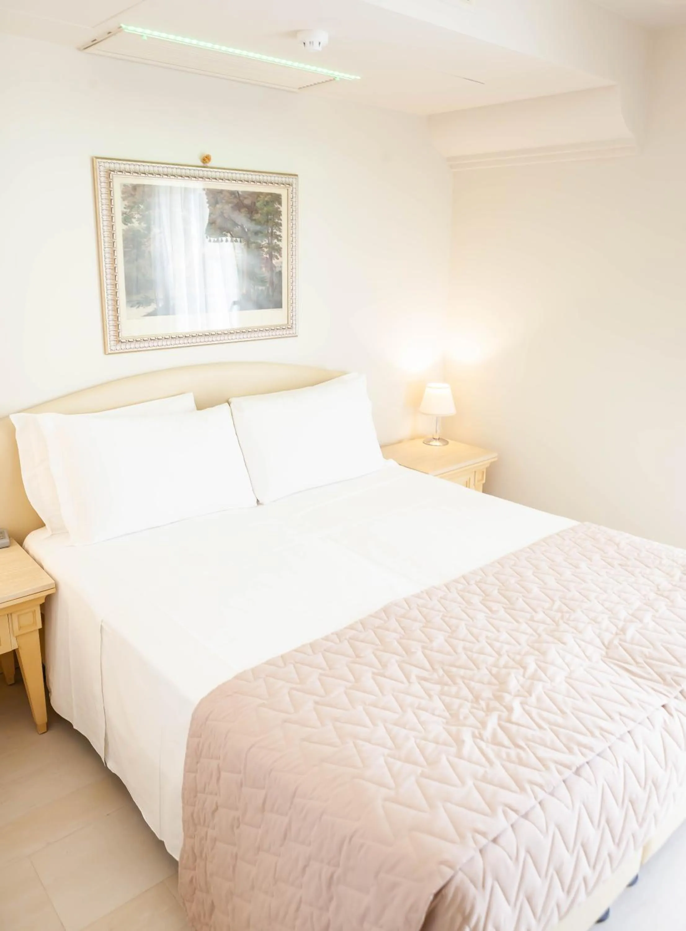 Bed in Hotel Conchiglia