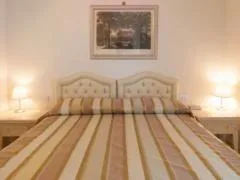 Bed in Hotel Conchiglia