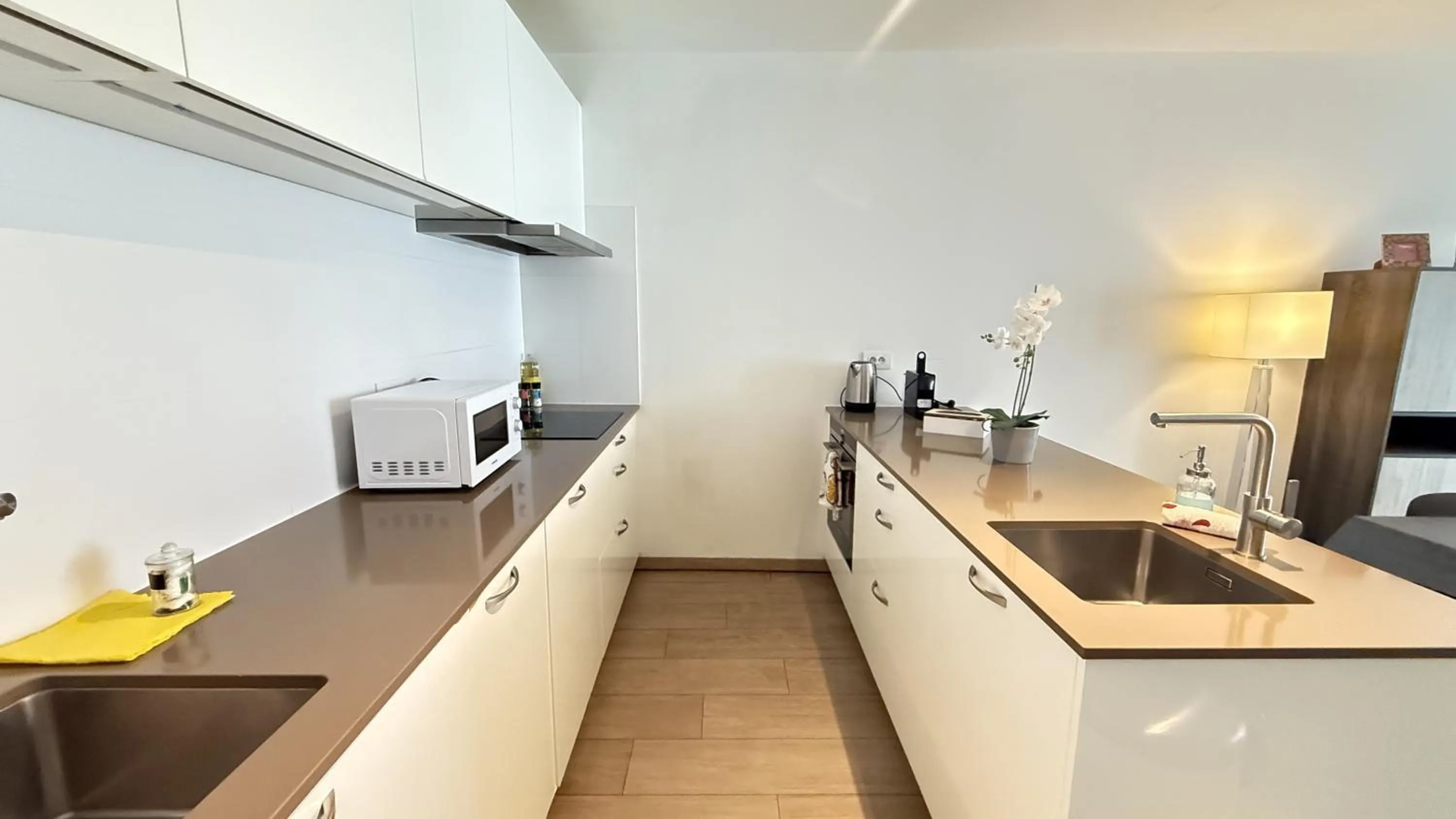 Kitchen or kitchenette in OneLuxStay near Diamond District