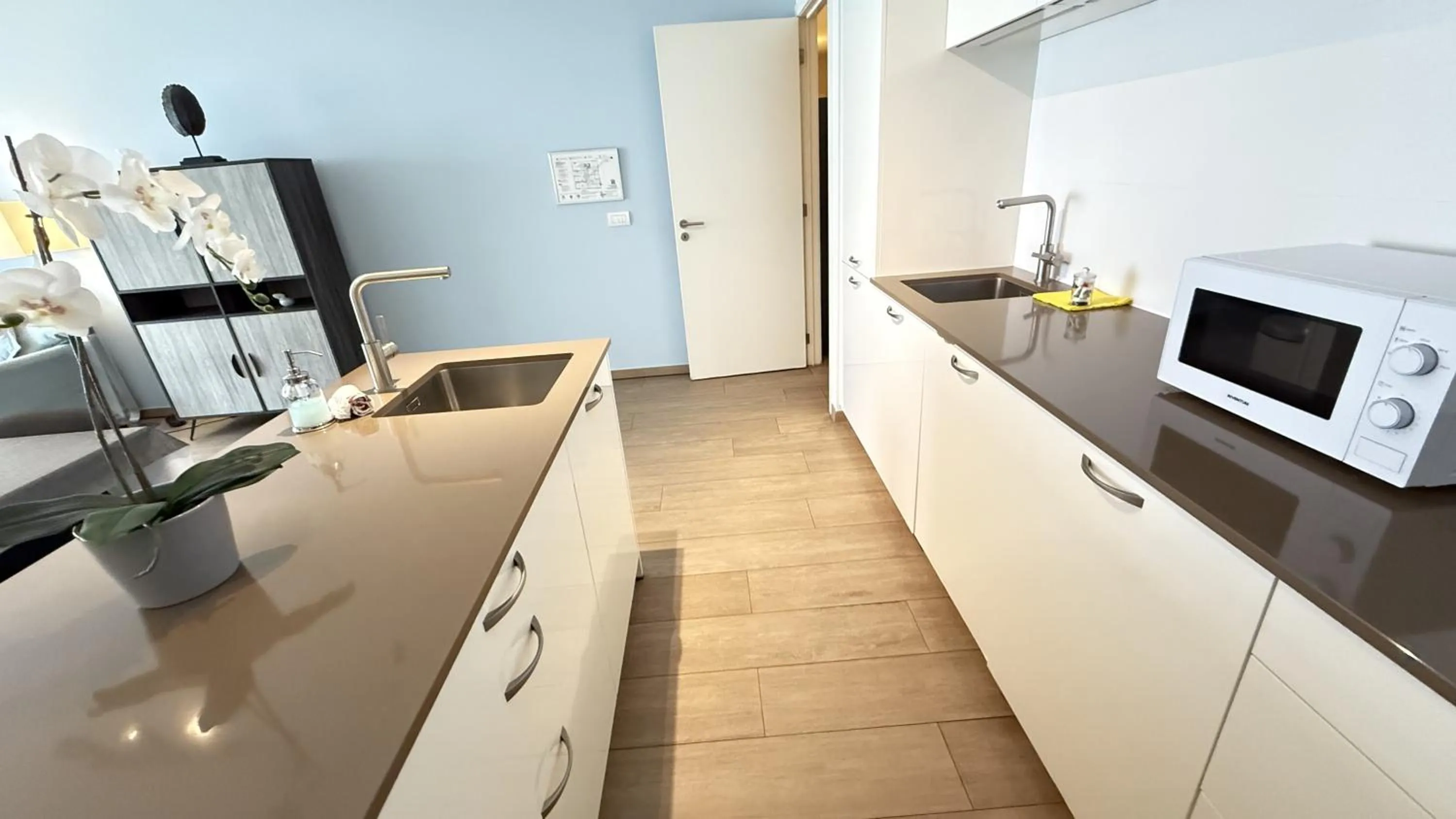 kitchen in OneLuxStay near Diamond District