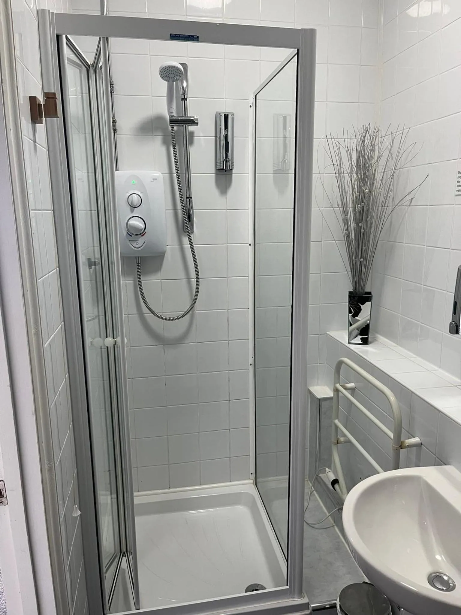 Shower in The Calder House Hotel