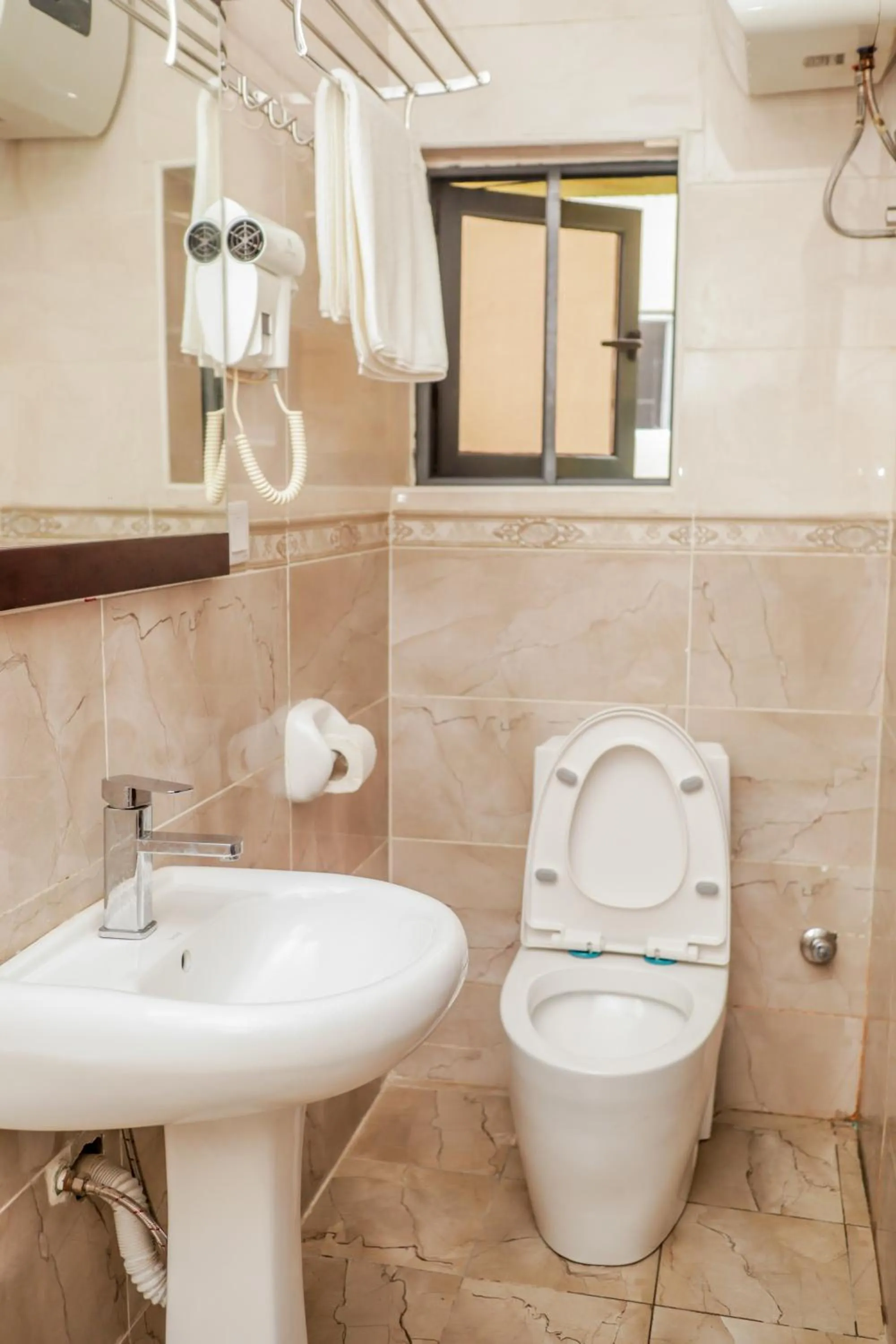 Shower in De Rembrandt Hotels and Suites