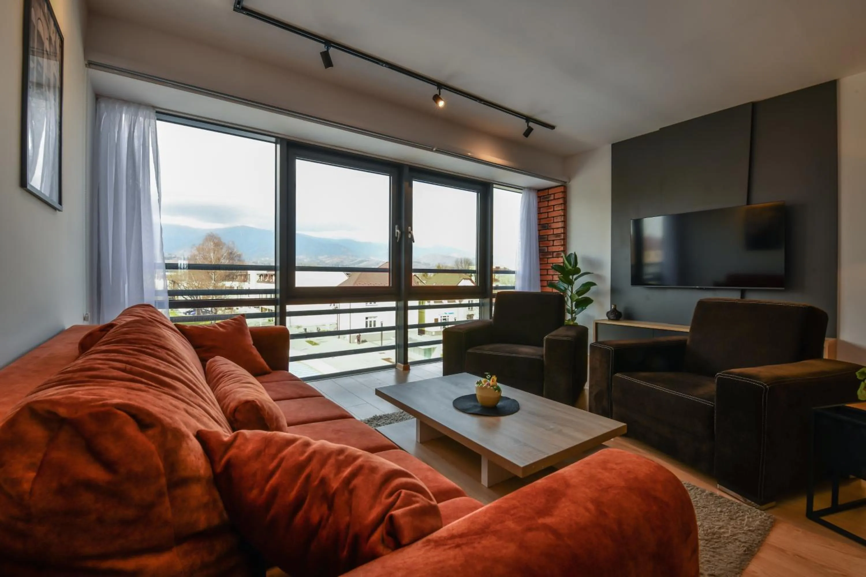 Communal lounge/ TV room in Central Apartments