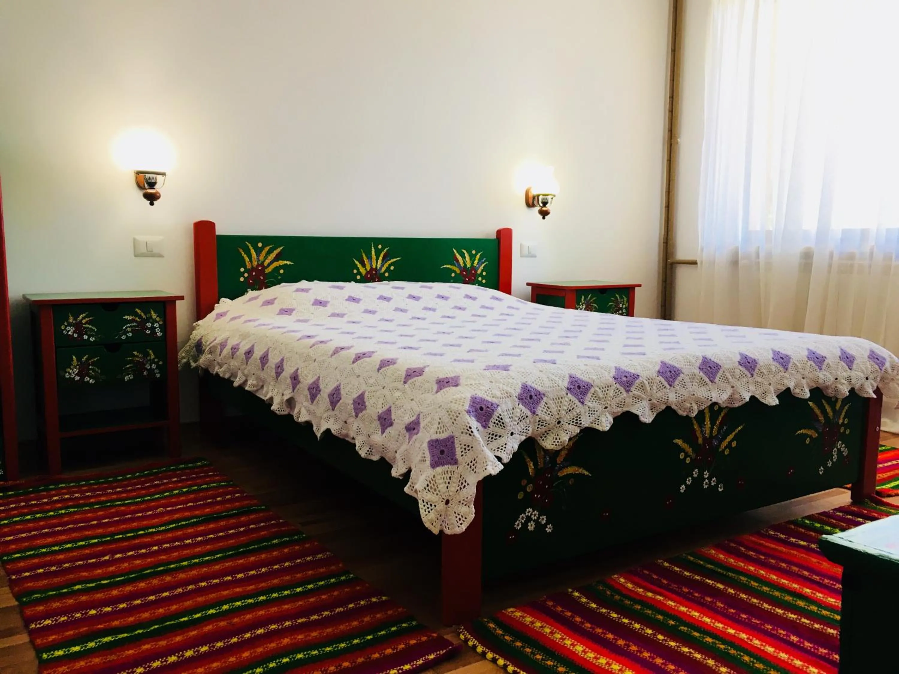 Bed in Pensiunea Ambiance