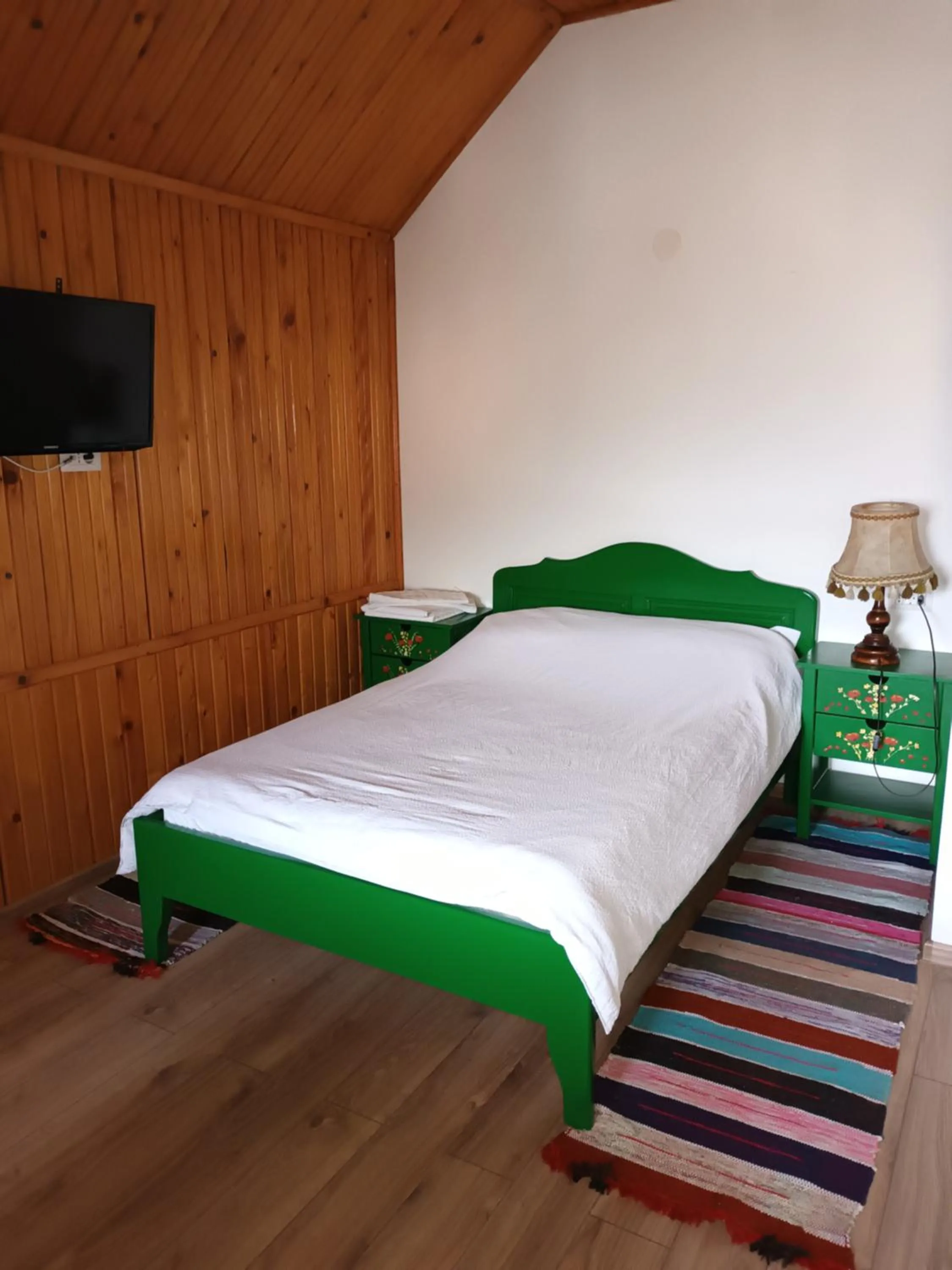 Bed in Pensiunea Ambiance