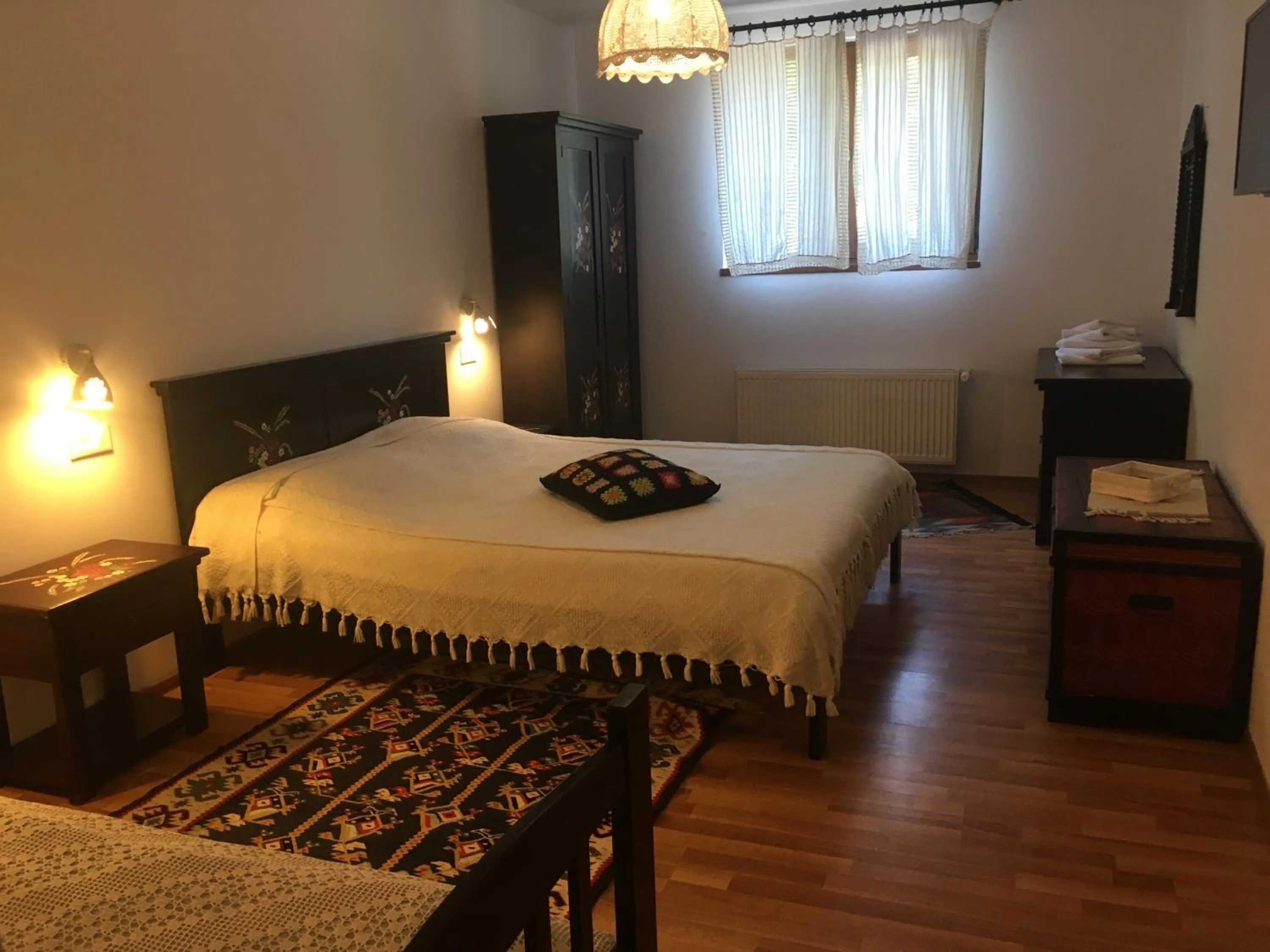 Bed in Pensiunea Ambiance
