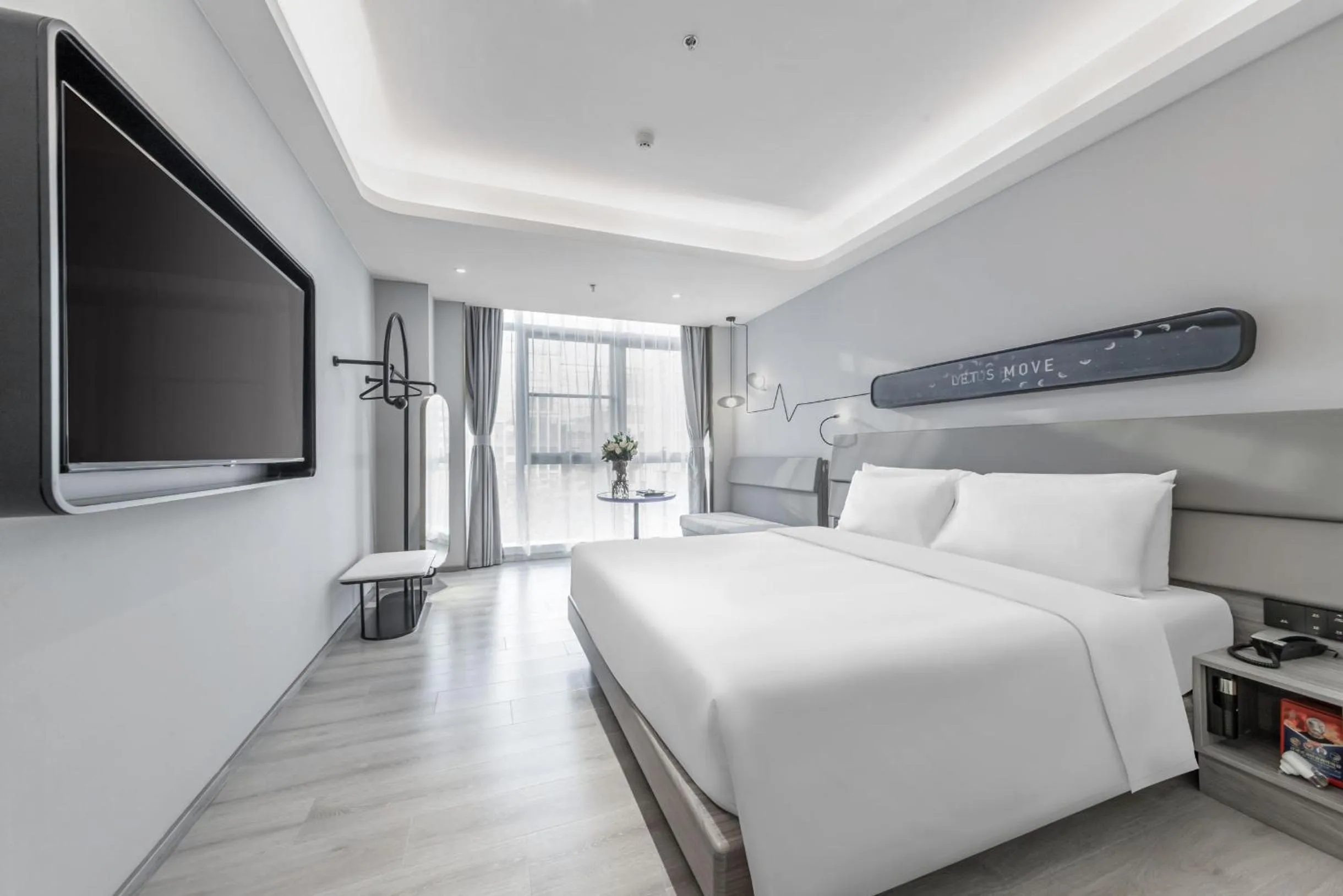 Bed in Atour X Hotel Yangzhou East Station Li Ning Sports Park