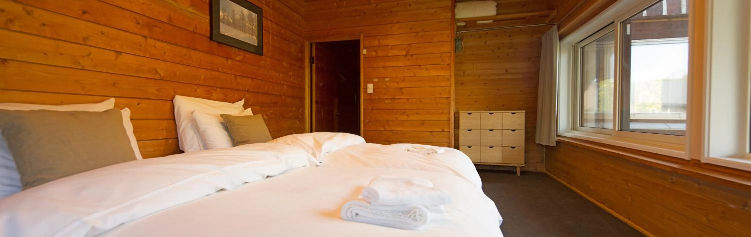 Photo of the whole room, Bed in Moiwa Lodge