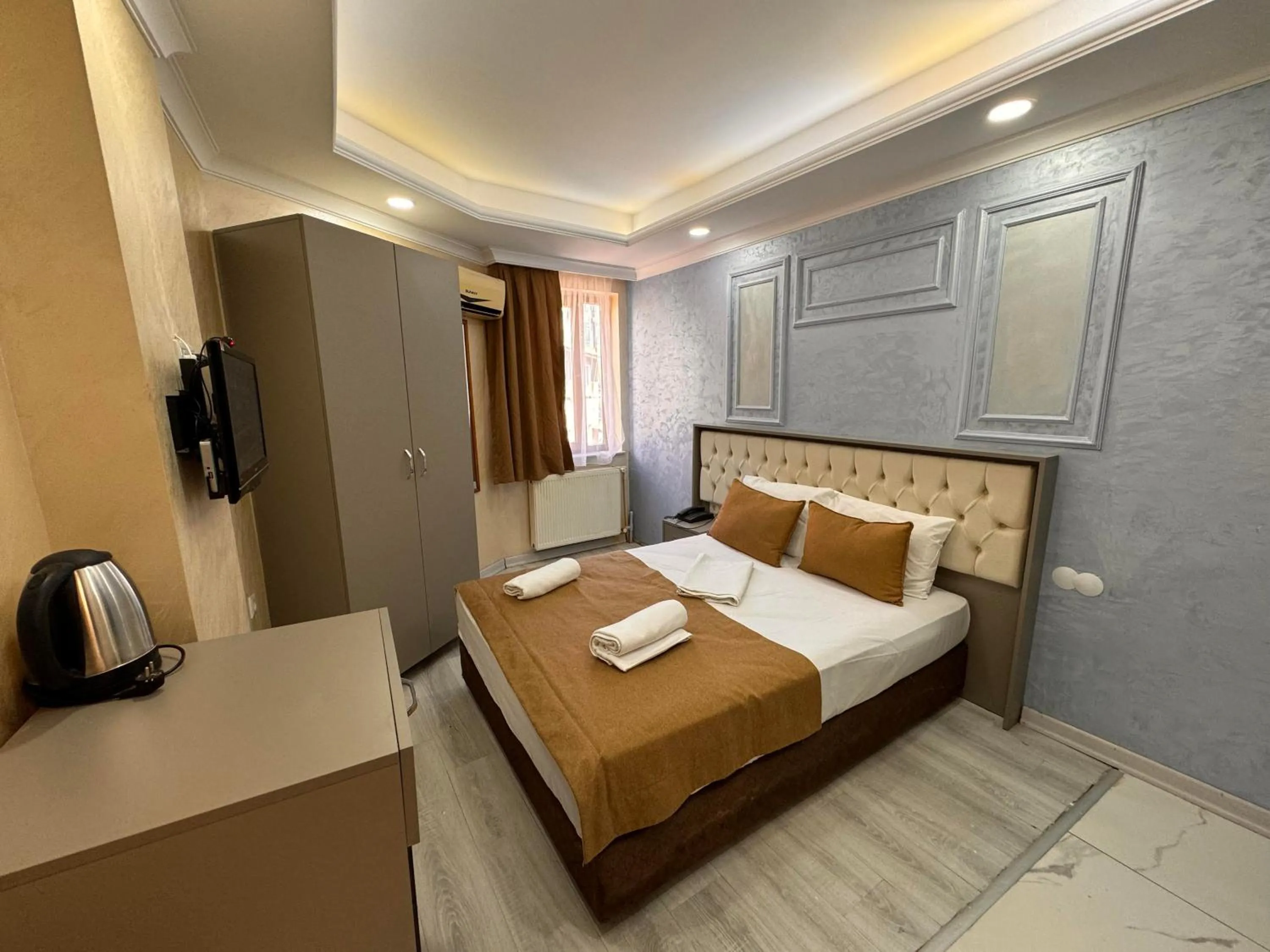 Bed in Grand Kybele Hotel